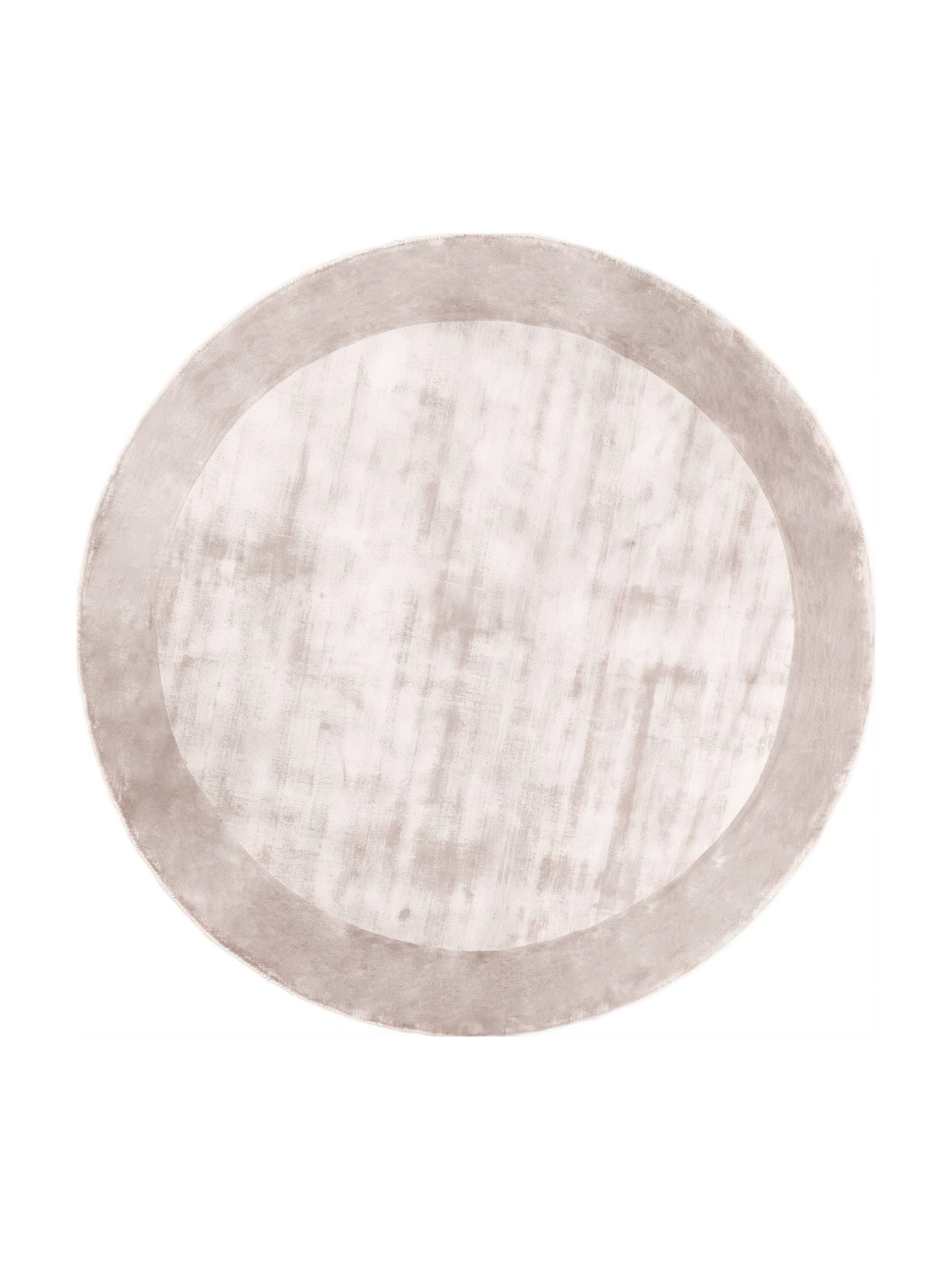 Tapis rond avec motif texturé, tons gris et argentés, ambiance neutre et douce