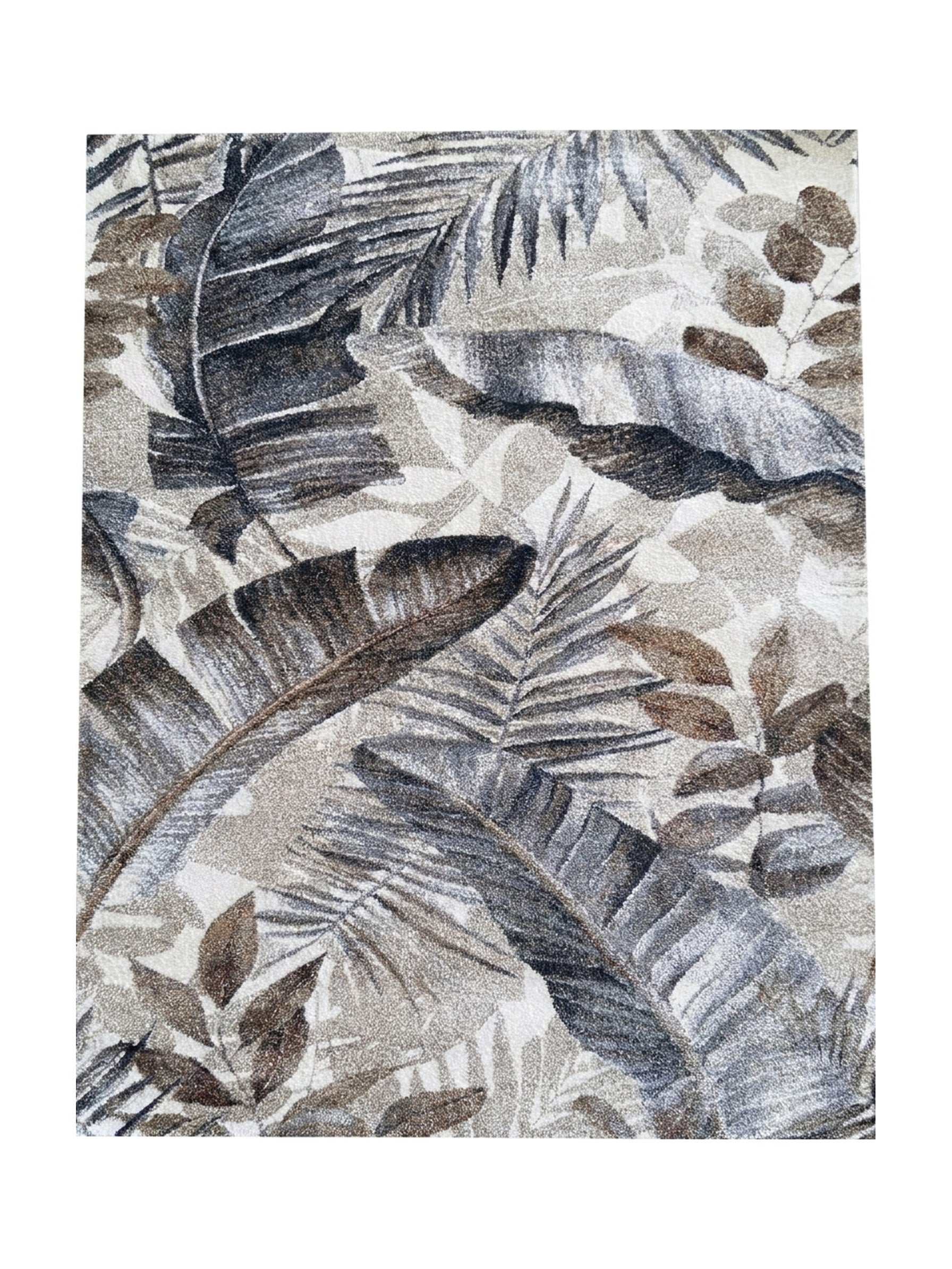 Un tapis à motifs de feuilles tropicales dans des tons de crème, beige, gris et marron, avec une texture douce