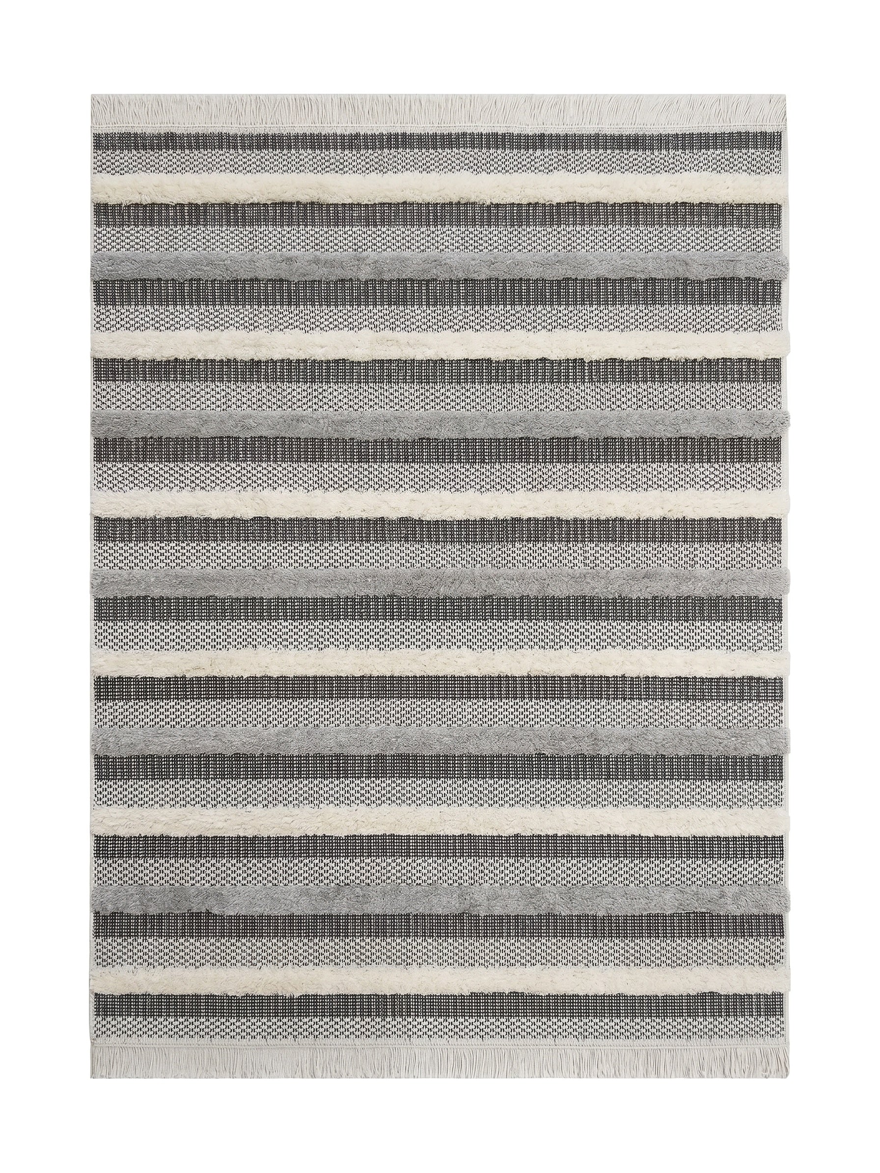 Tapis rectangulaire à rayures horizontales crème, gris clair et gris foncé, alternant textures tissées et moelleuses, avec franges