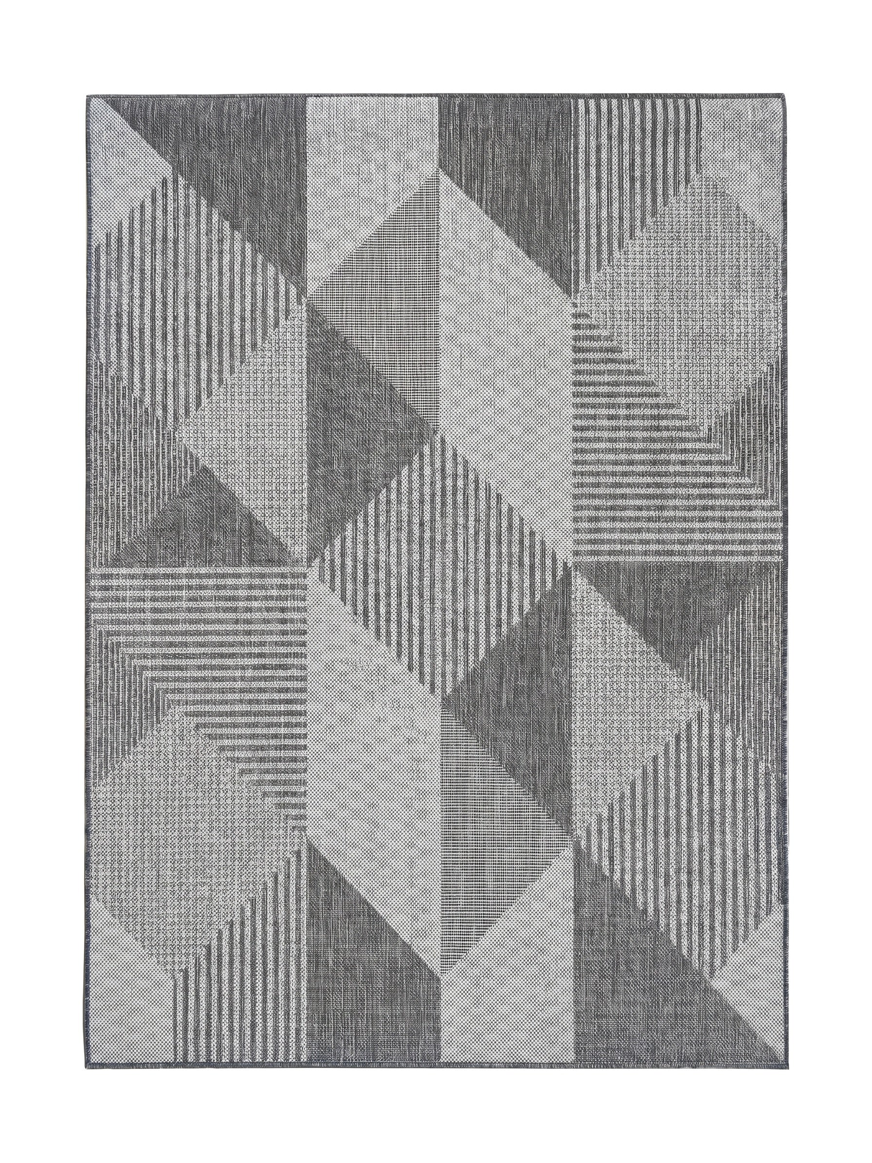 Tapis en matière textile aux tons de gris, présentant un motif géométrique 3D de cubes avec des textures unies, rayées et pointillées