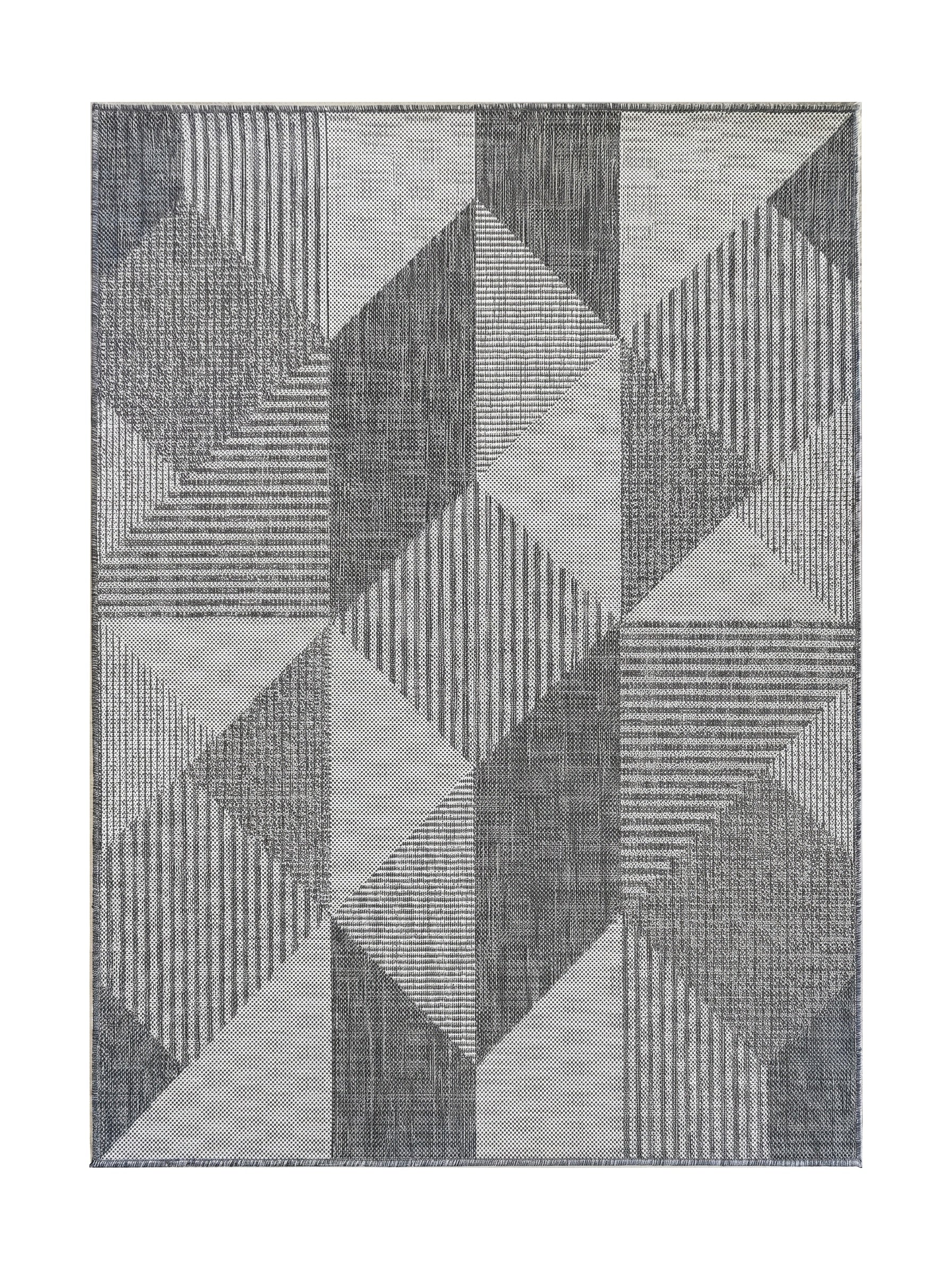 Tapis géométrique gris clair et gris foncé avec des motifs de triangles et de formes texturées en relief optique