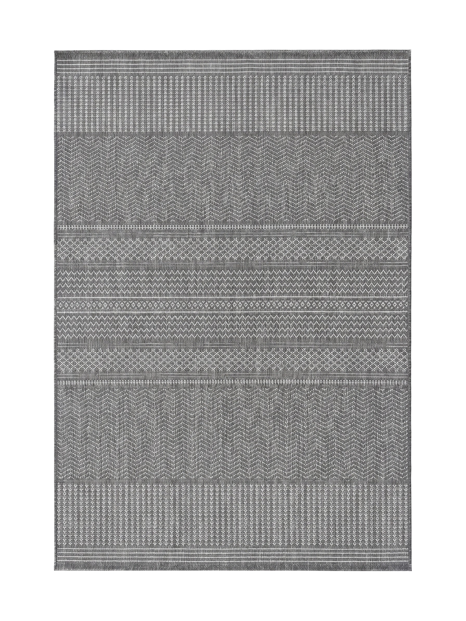 Tapis rectangulaire aux motifs géométriques en bandes horizontales gris clair et foncé, incluant chevrons et lignes verticales