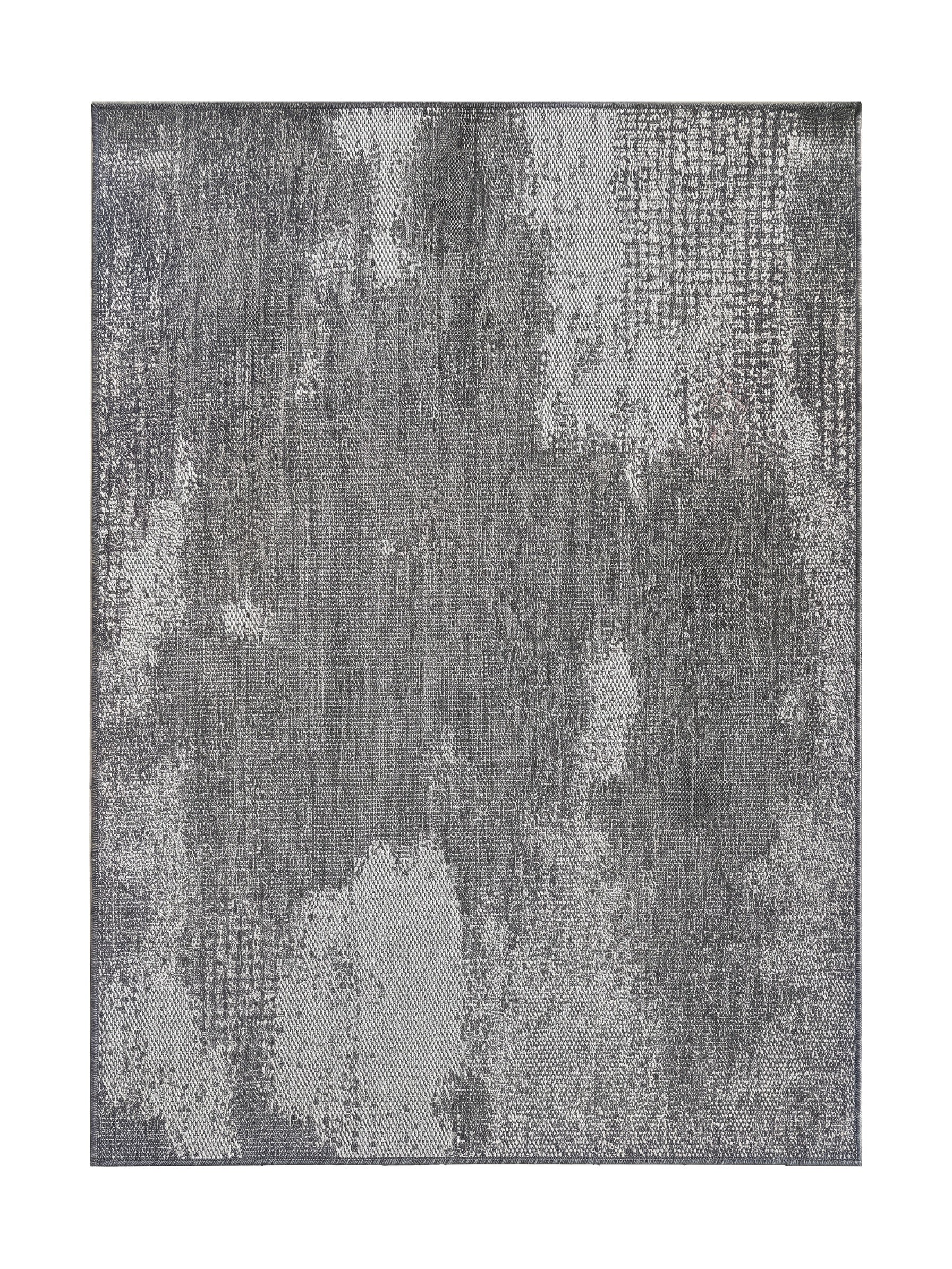 Tapis rectangulaire tissé gris avec des motifs abstraits et irréguliers gris clair, donnant un aspect délavé