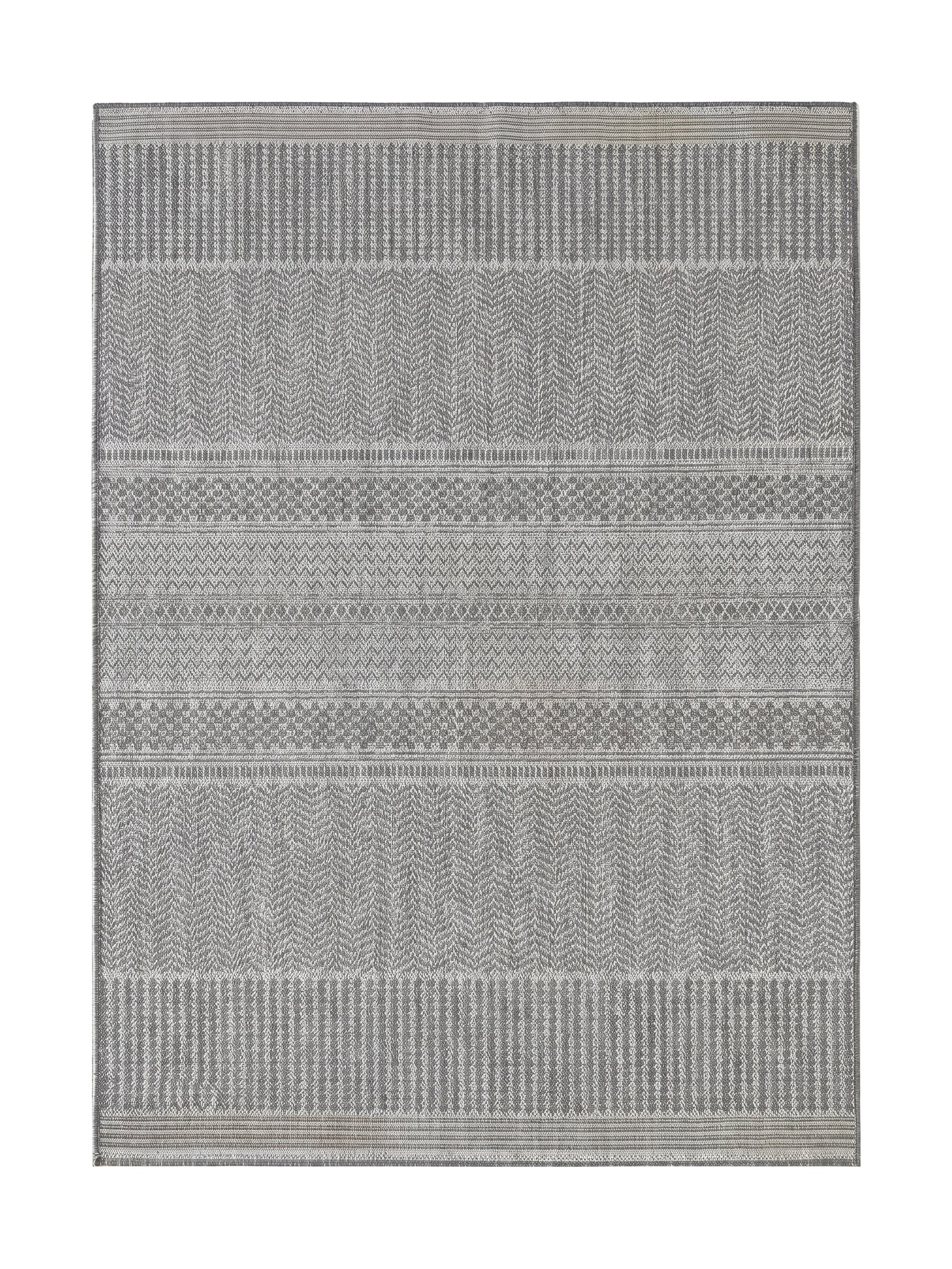 Tapis rectangulaire aux motifs géométriques tissés, avec des bandes horizontales de chevrons et rayures en différentes nuances de gris