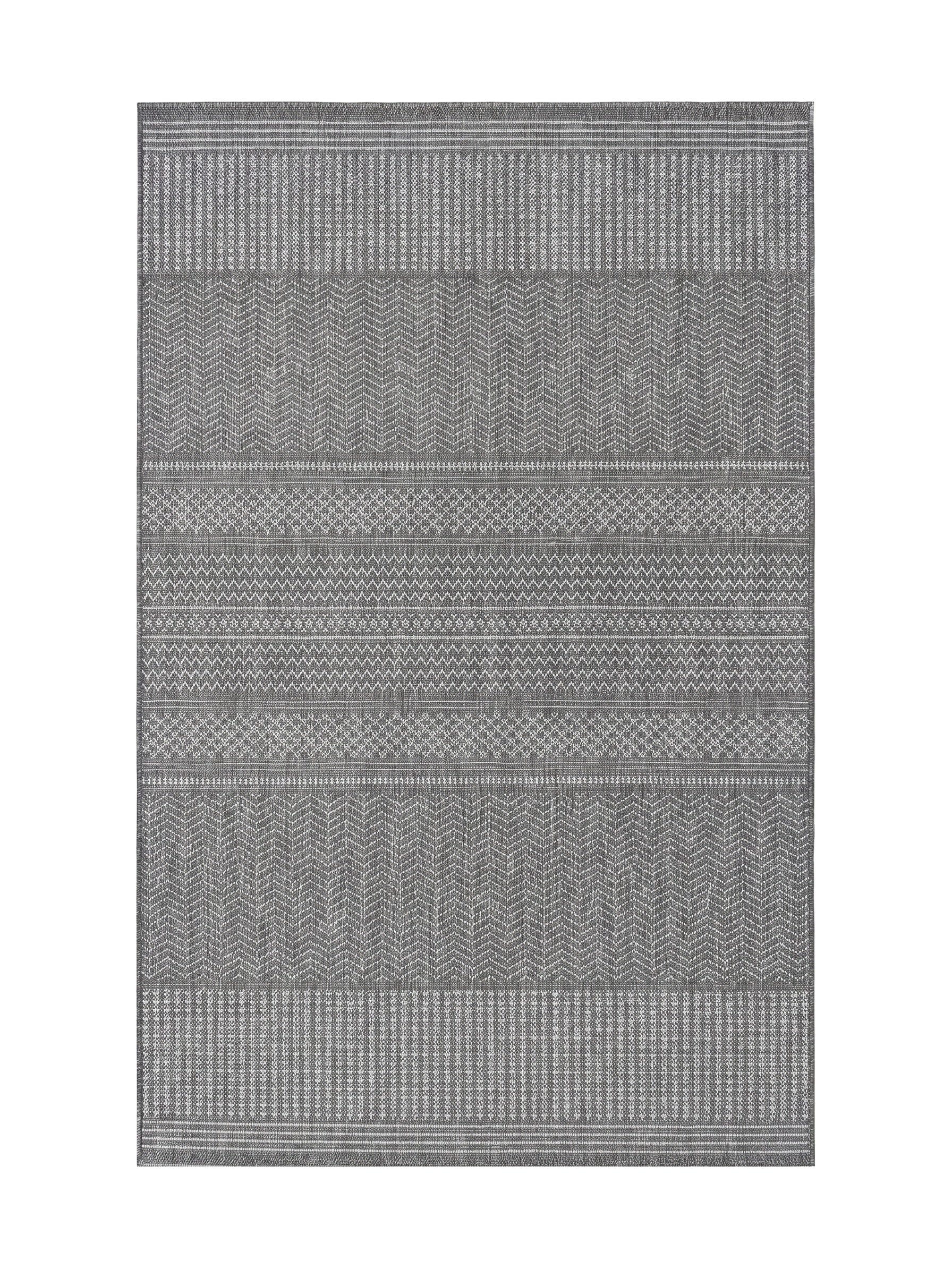 Tapis rectangulaire aux motifs géométriques en bandes horizontales gris clair et foncé, incluant chevrons et lignes verticales