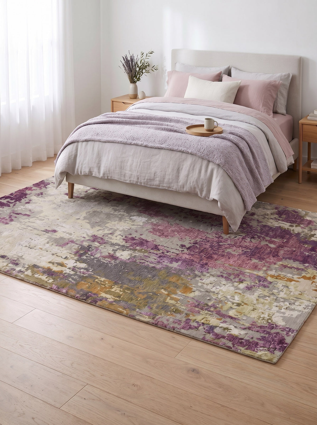 Plum & Ivory Wool & Viscose Rug - Ametista under the bed in a bright modern bedroom with light oak floorboards