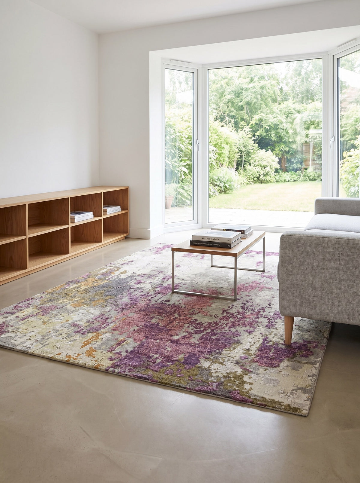 Plum & Ivory Wool & Viscose Rug - Ametista in an architect-designed living room with polished concrete floors