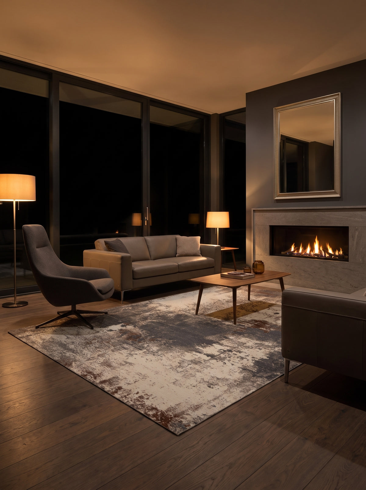 With a rectangular abstract pattern blending slate blue, brown, and cream, this washable rug decorates a living room at night