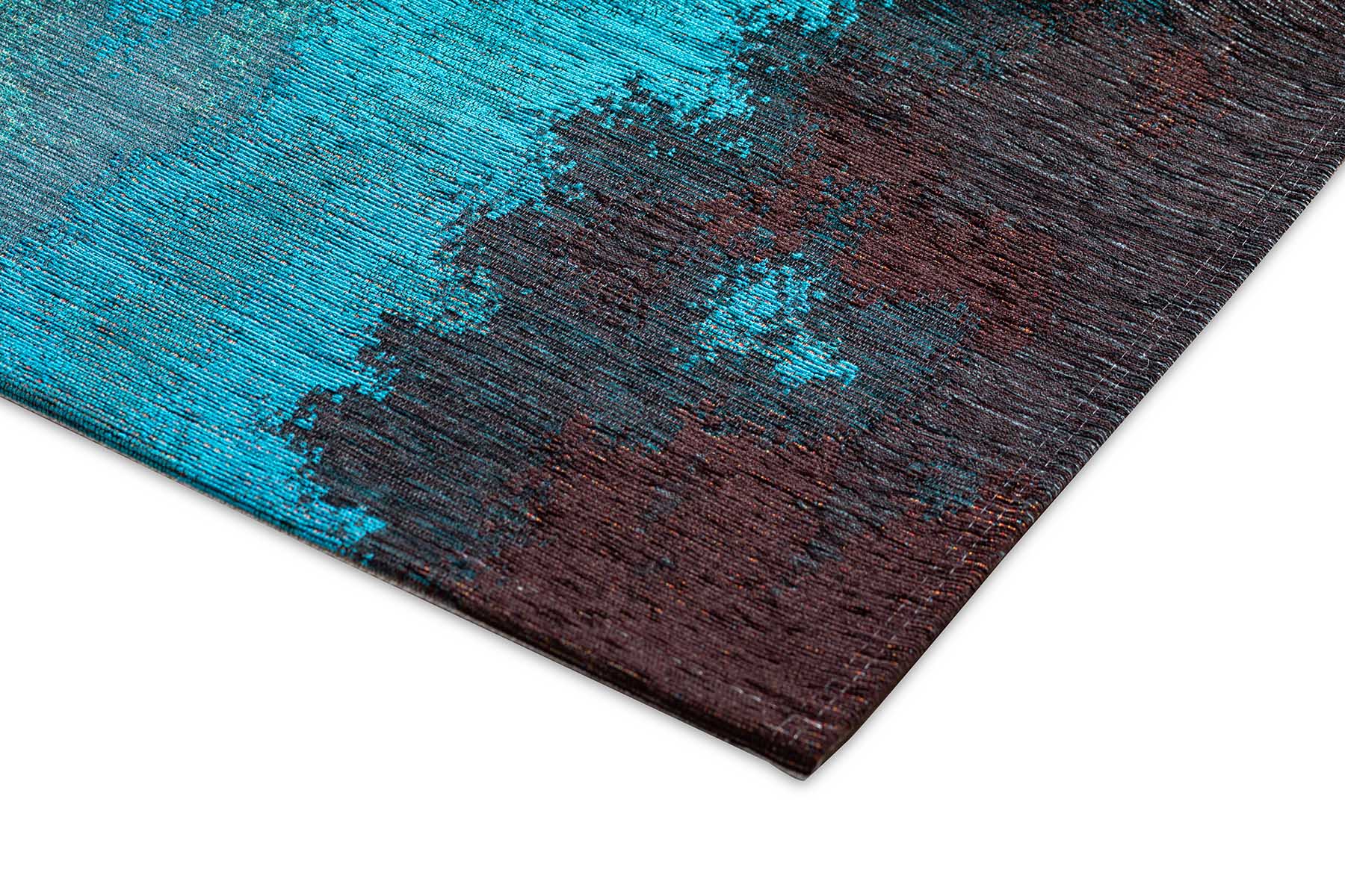 Bordure de tapis rectangulaire avec des couleurs turquoise et marron. Finition de qualité avec des coutures apparentes