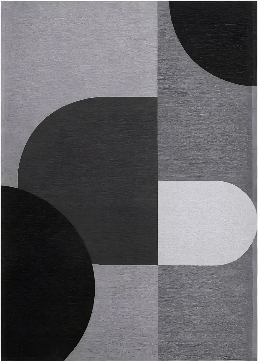 Tapis abstrait avec motif géométrique, gris et noir. Formes ovales et rectangulaires. Ambiance moderne