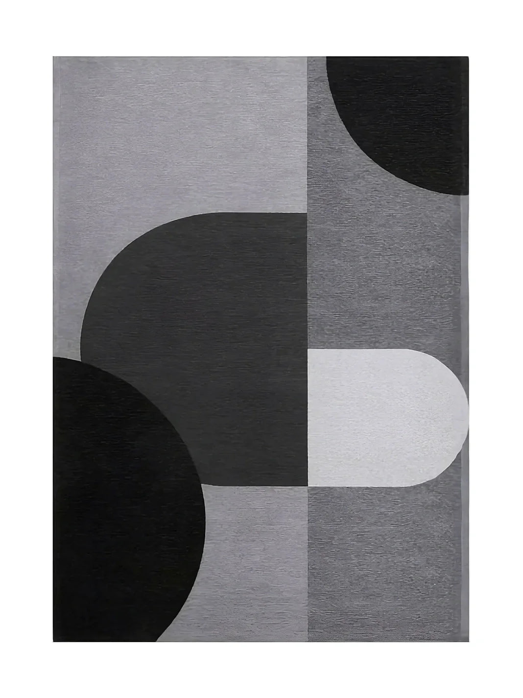 Tapis abstrait avec motif géométrique, gris et noir. Formes ovales et rectangulaires. Ambiance moderne