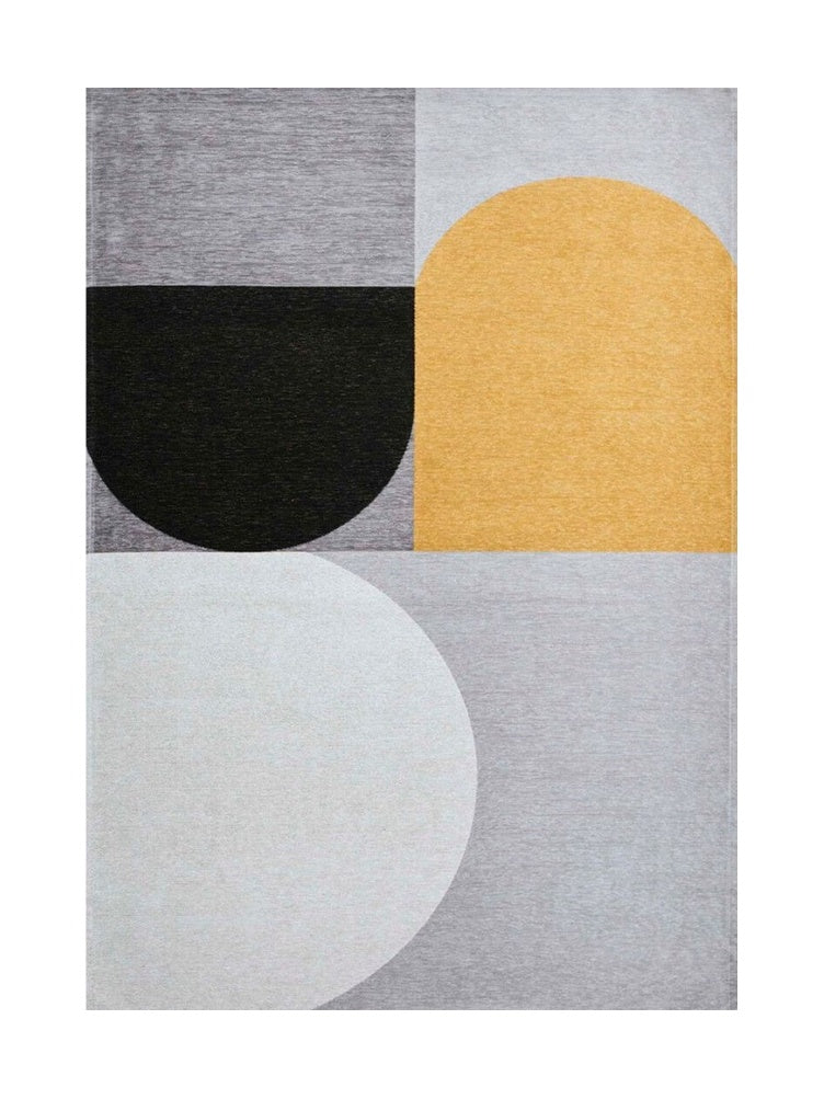 Tapis rectangulaire avec motif géométrique abstrait. Couleurs principales: gris, noir, jaune et blanc