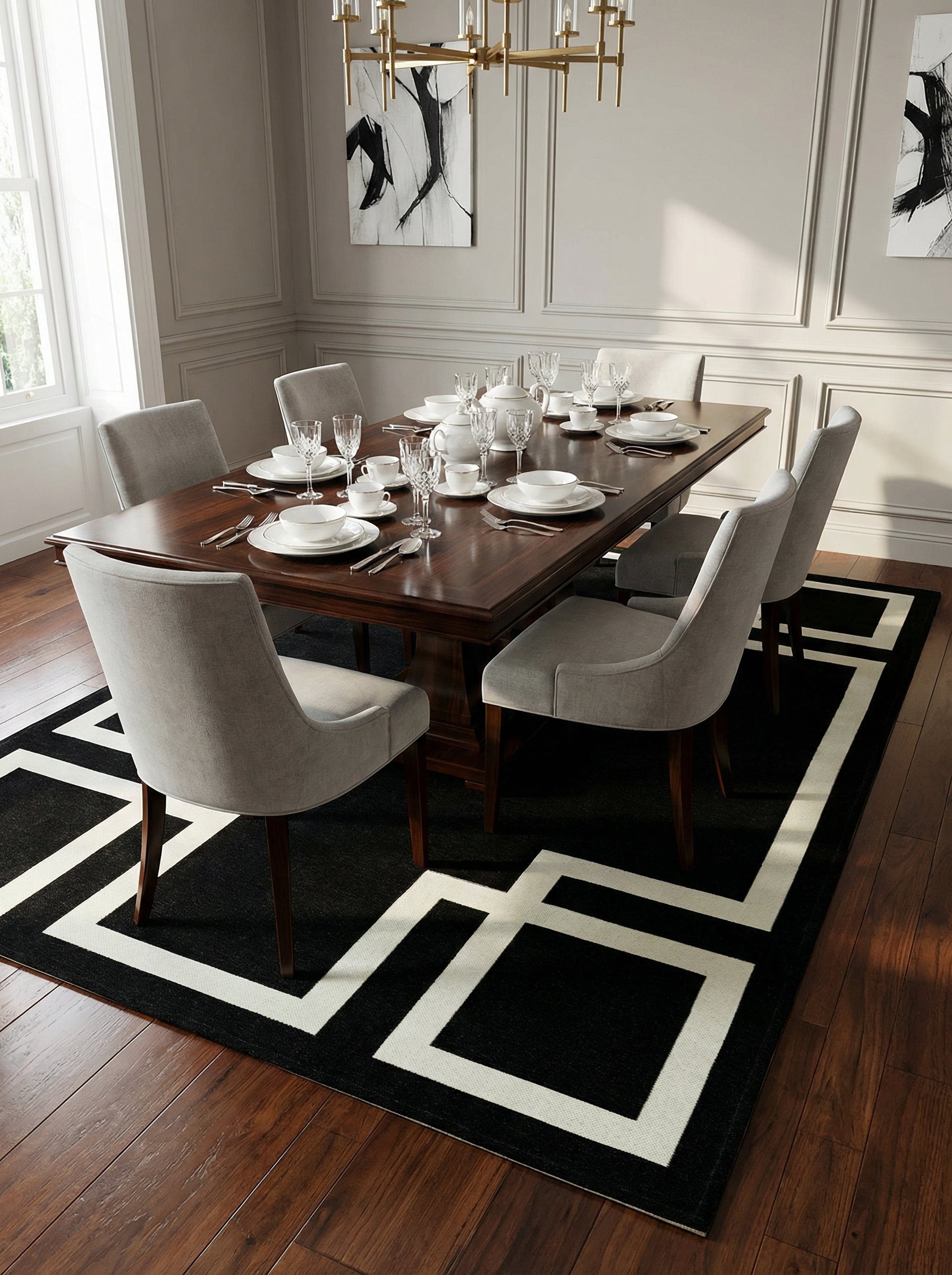 Tapis rectangulaire noir et blanc sous une table à manger. Définit l'espace repas, ambiance conviviale