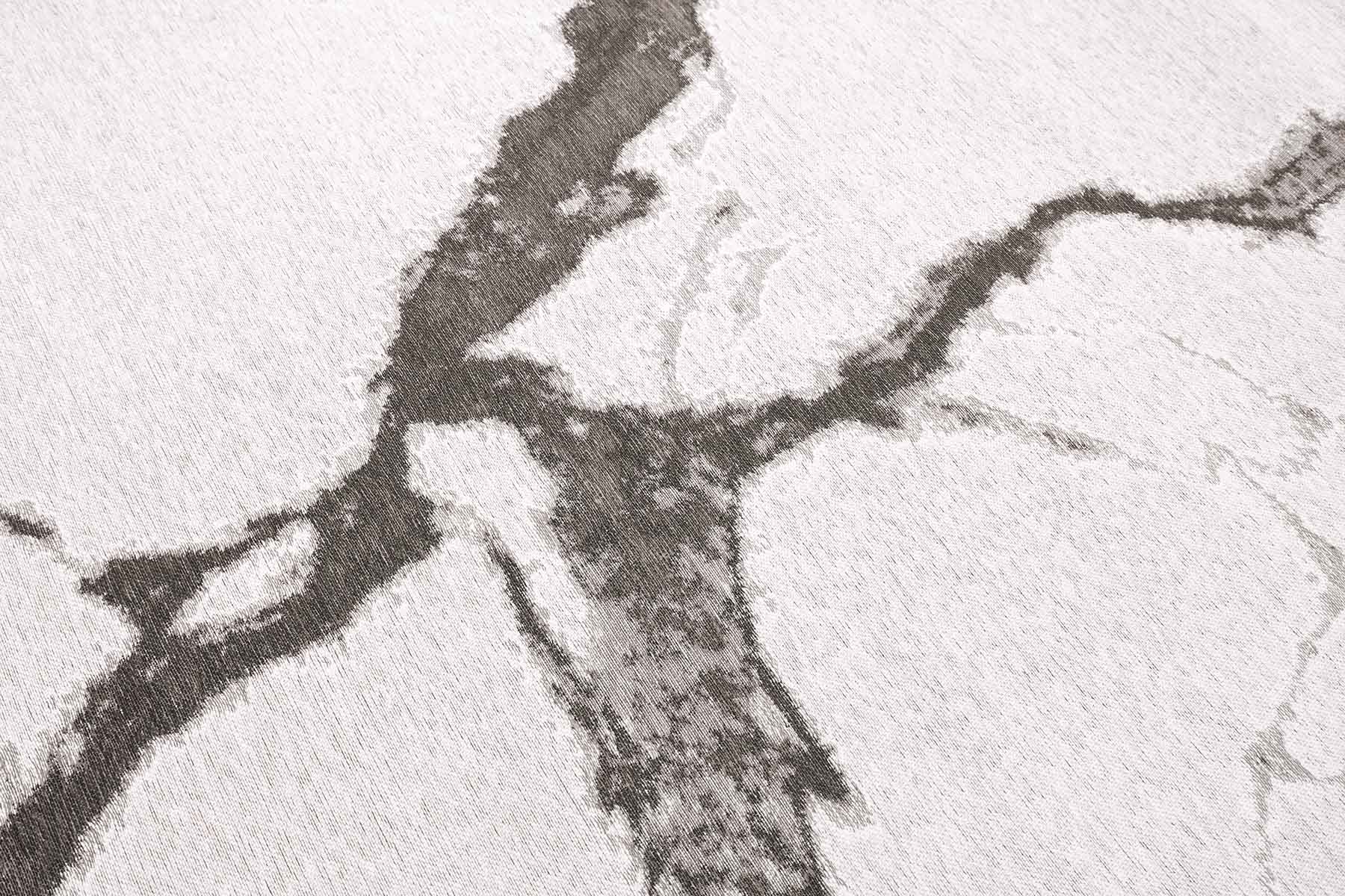 Tapis rectangulaire ivoire. Motif veiné gris. Densité moyenne, moelleux perçu. Ambiance sobre et élégante