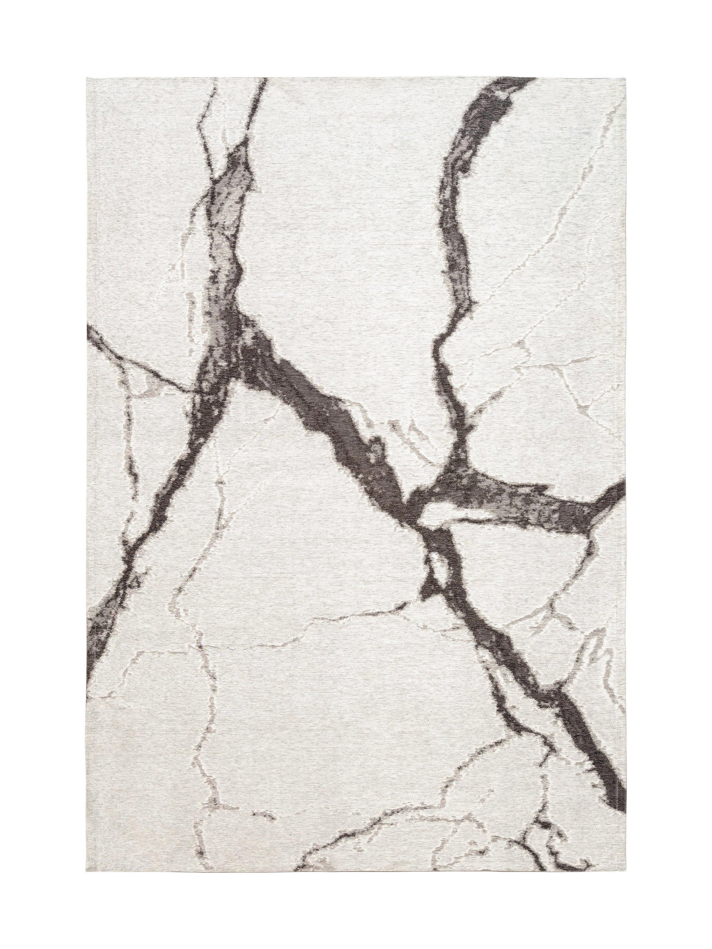 Tapis rectangulaire ivoire avec motif veiné gris foncé, style contemporain, ambiance moderne
