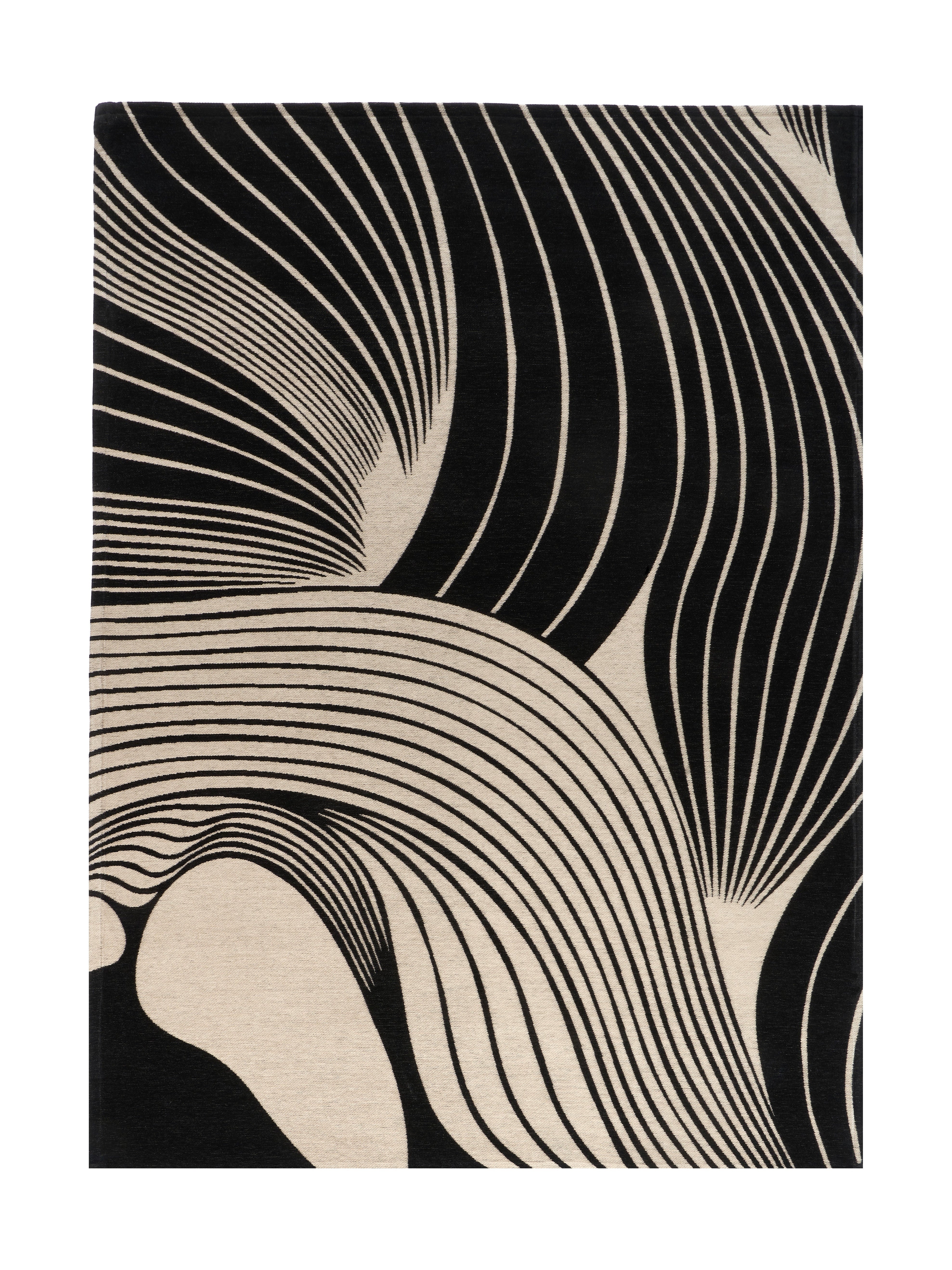 Tapis rectangulaire avec motif abstrait en noir et beige, ambiance moderne