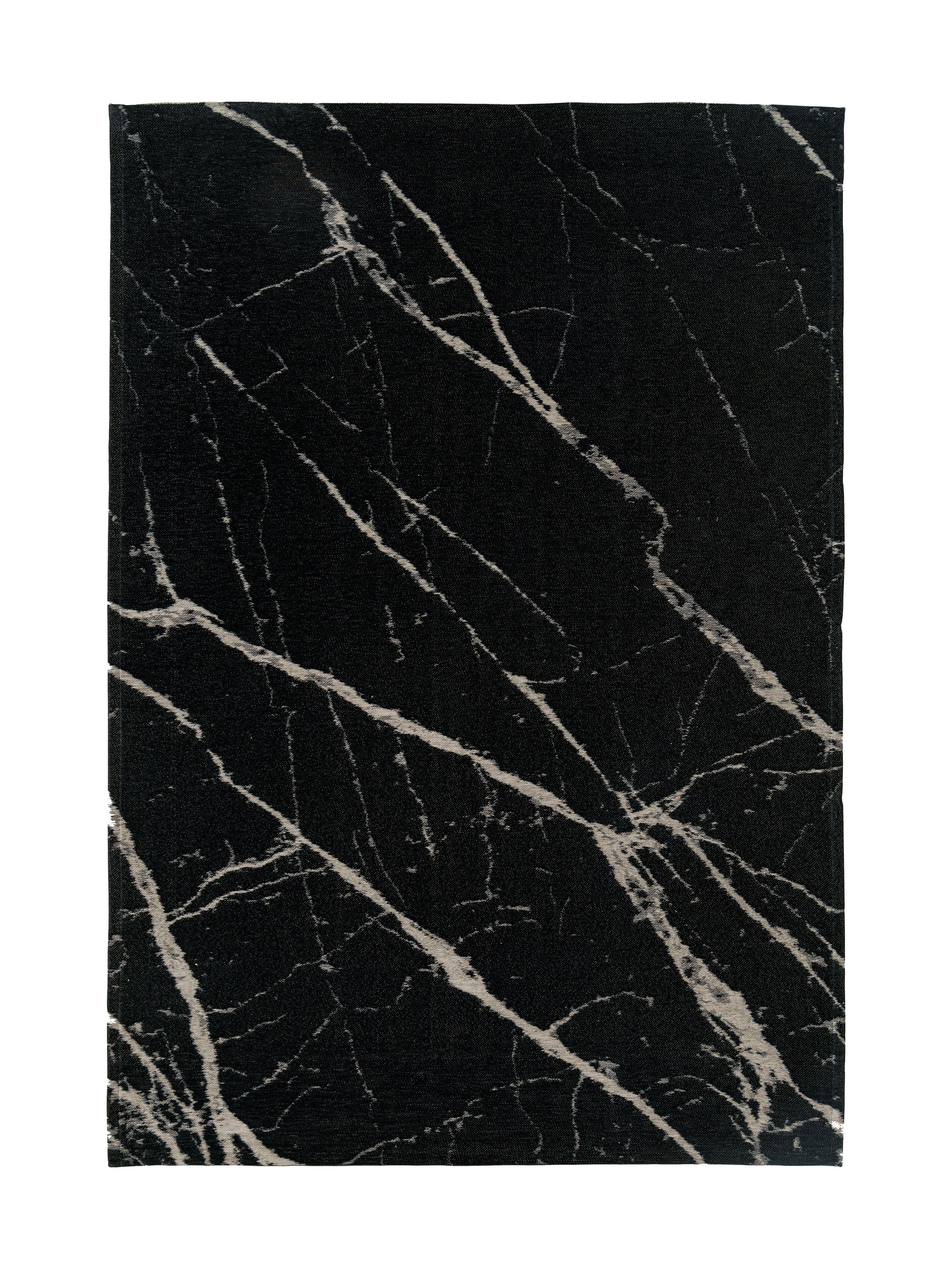 Tapis rectangulaire noir avec motif marbré beige, style moderne et élégant