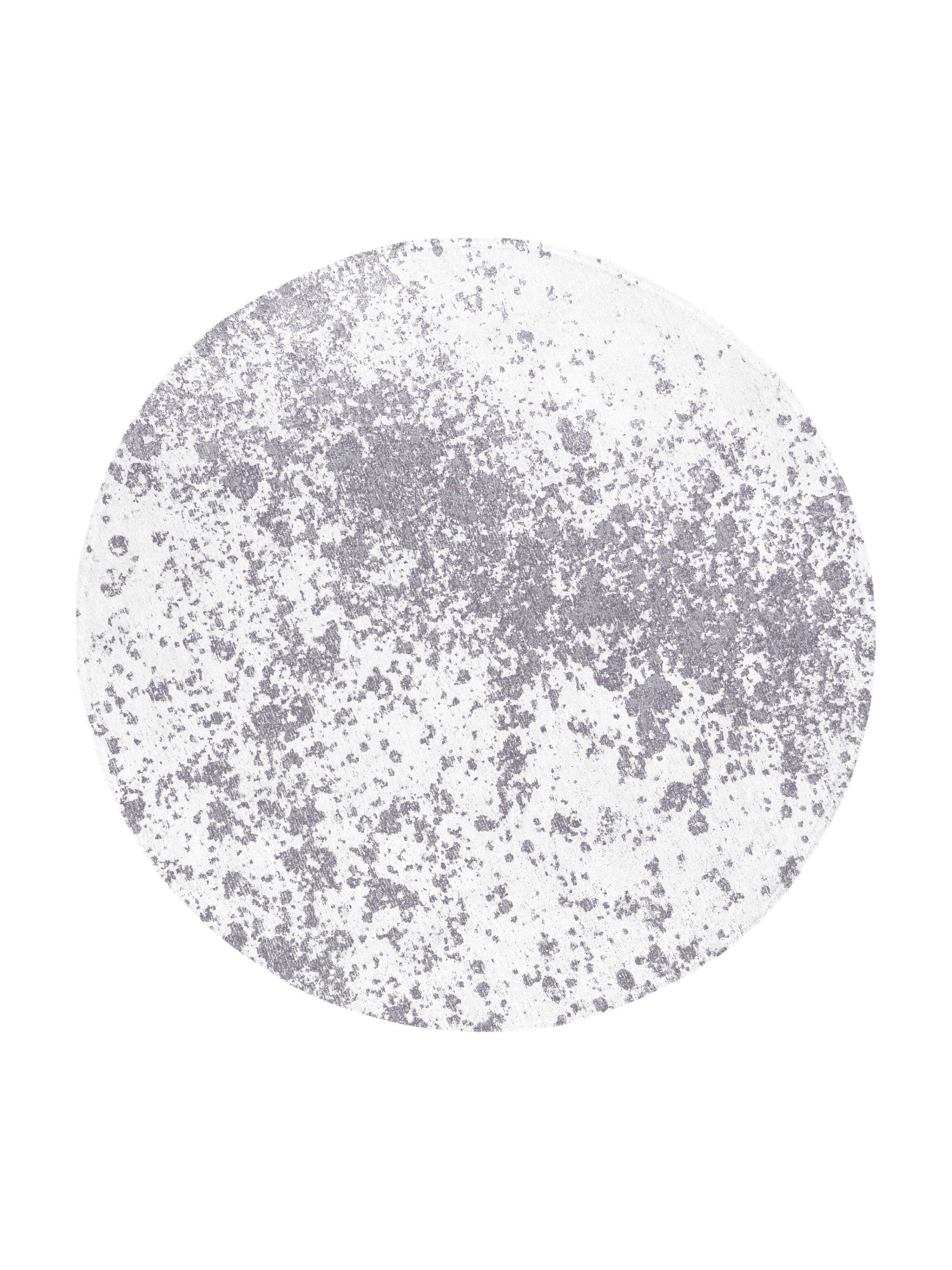 Tapis rond avec motif abstrait gris sur fond blanc, ambiance moderne