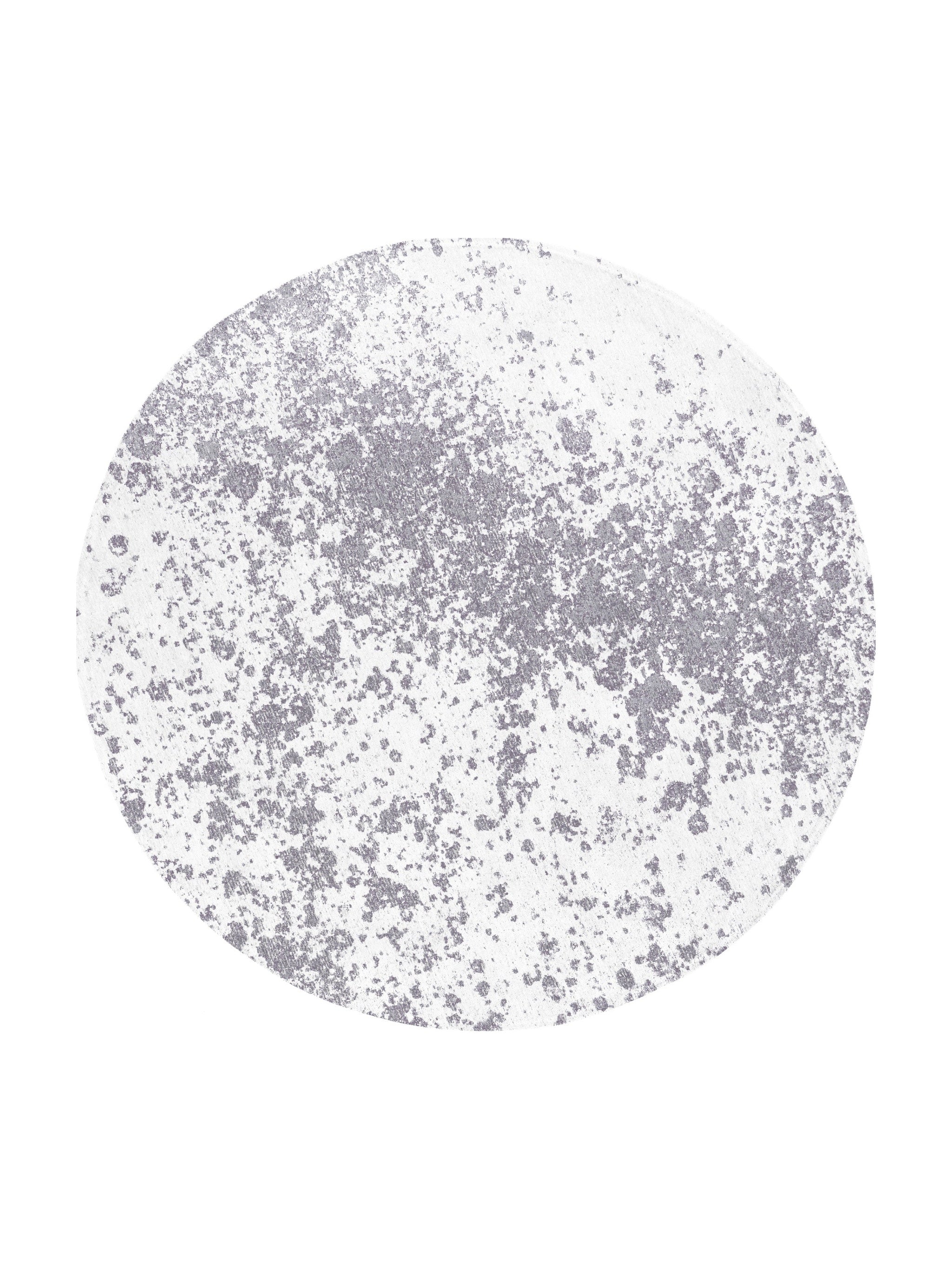 Tapis rond avec motif abstrait gris sur fond blanc, ambiance moderne