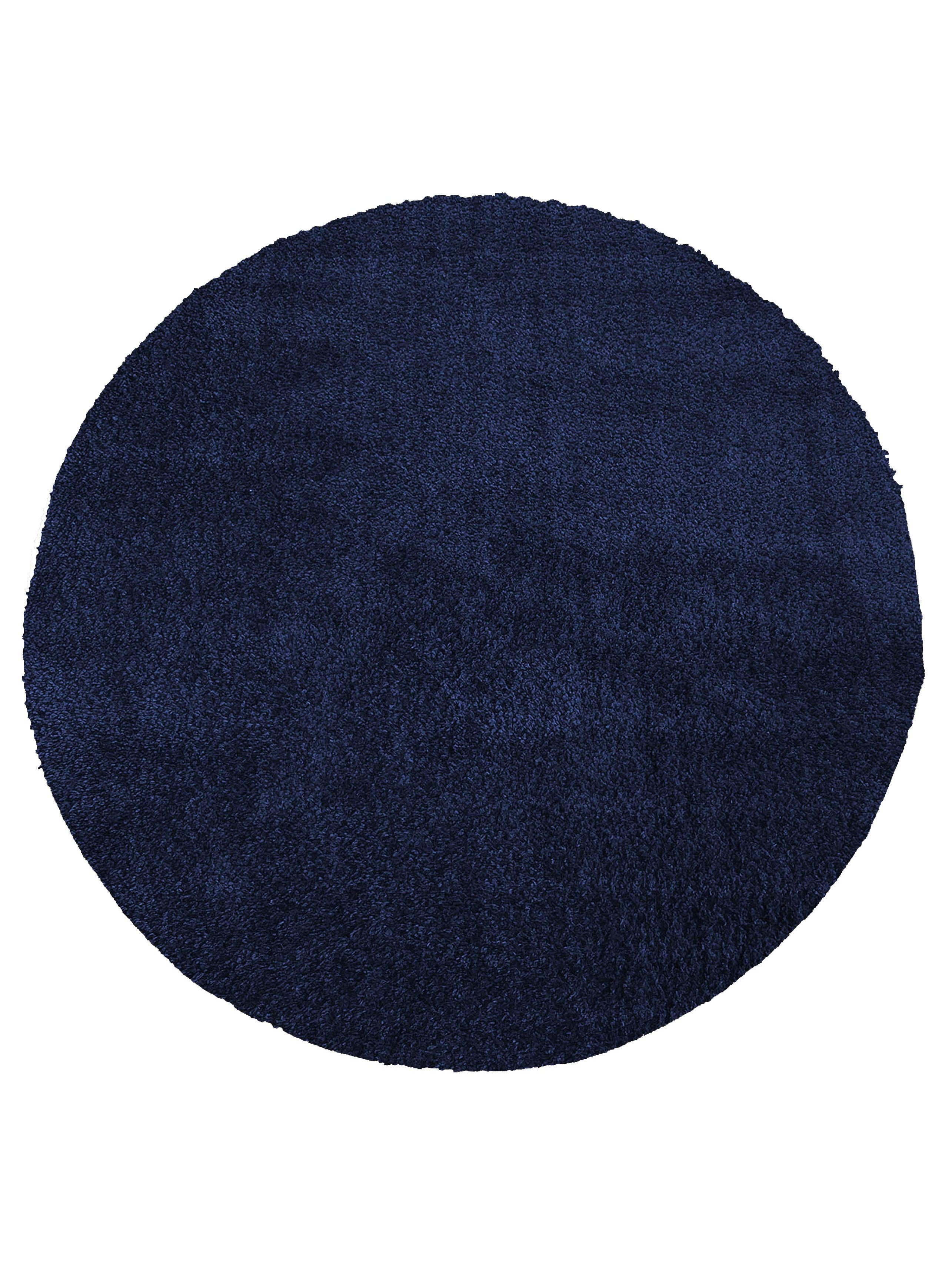 Tapis circulaire bleu marine uni avec un poil long et une texture douce et moelleuse