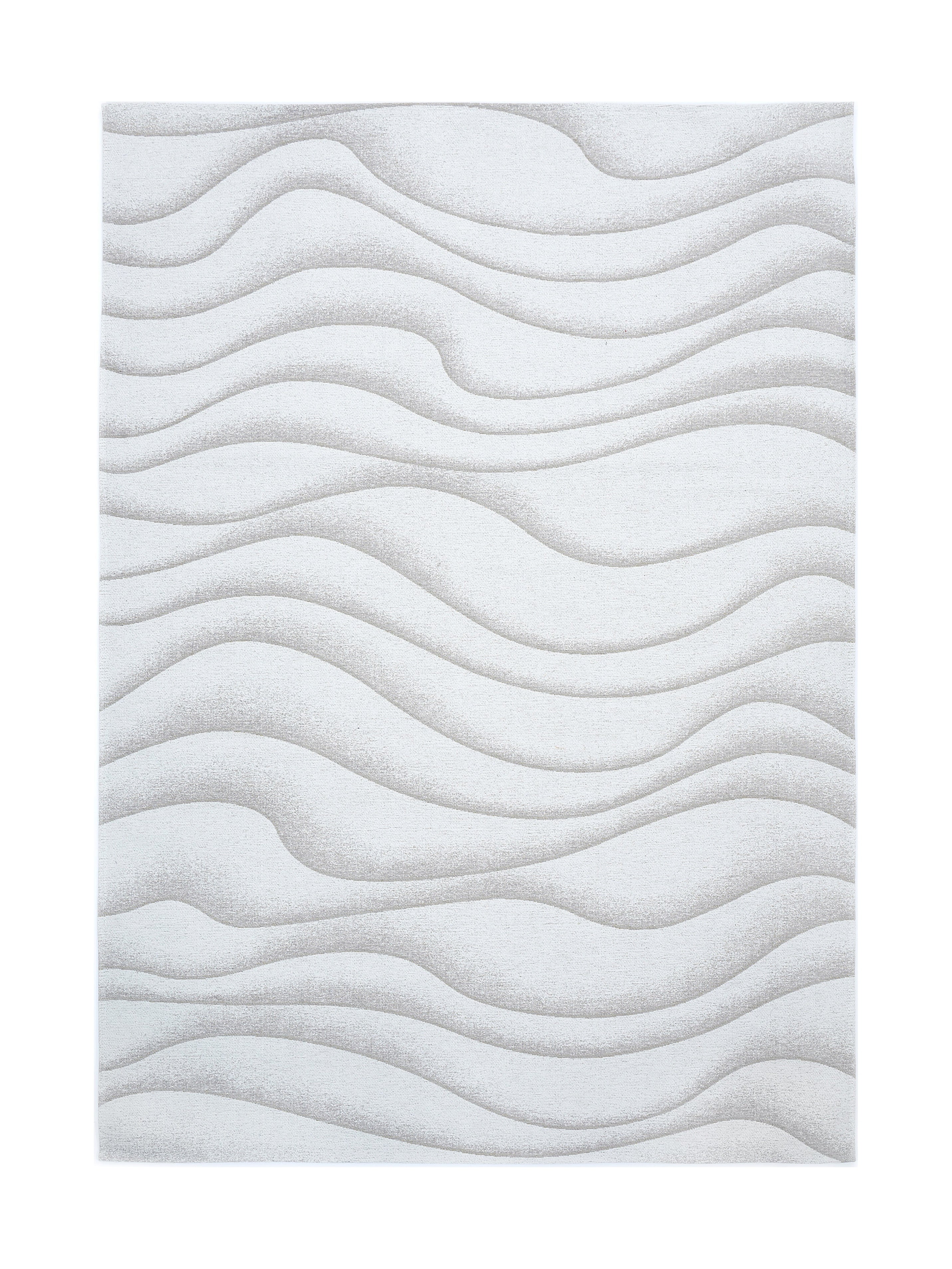 Tapis rectangulaire beige clair avec un motif ondulé en relief, créant une ambiance douce et apaisante