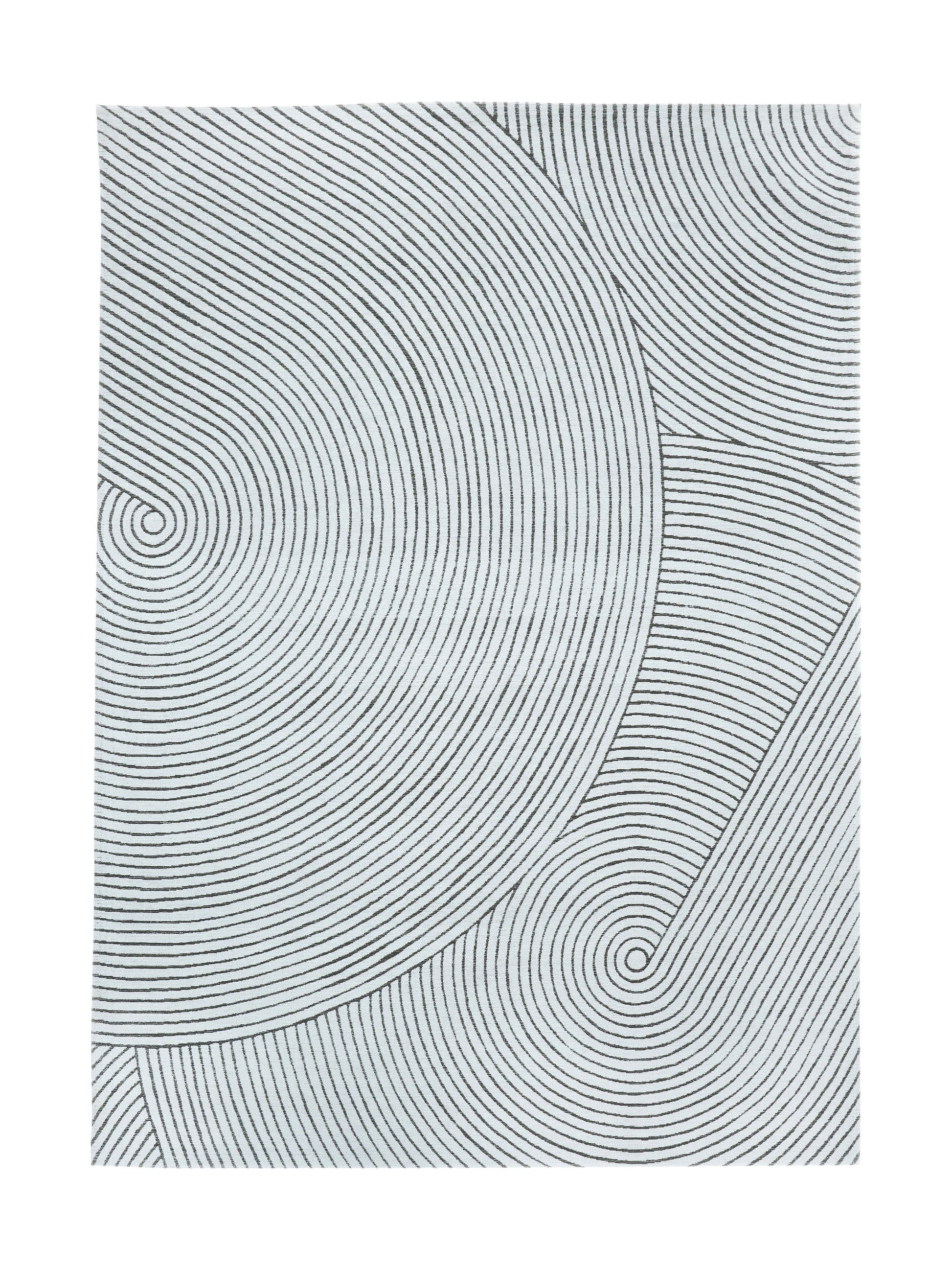 Tapis rectangulaire avec motif de cercles concentriques noirs sur fond blanc, style abstrait