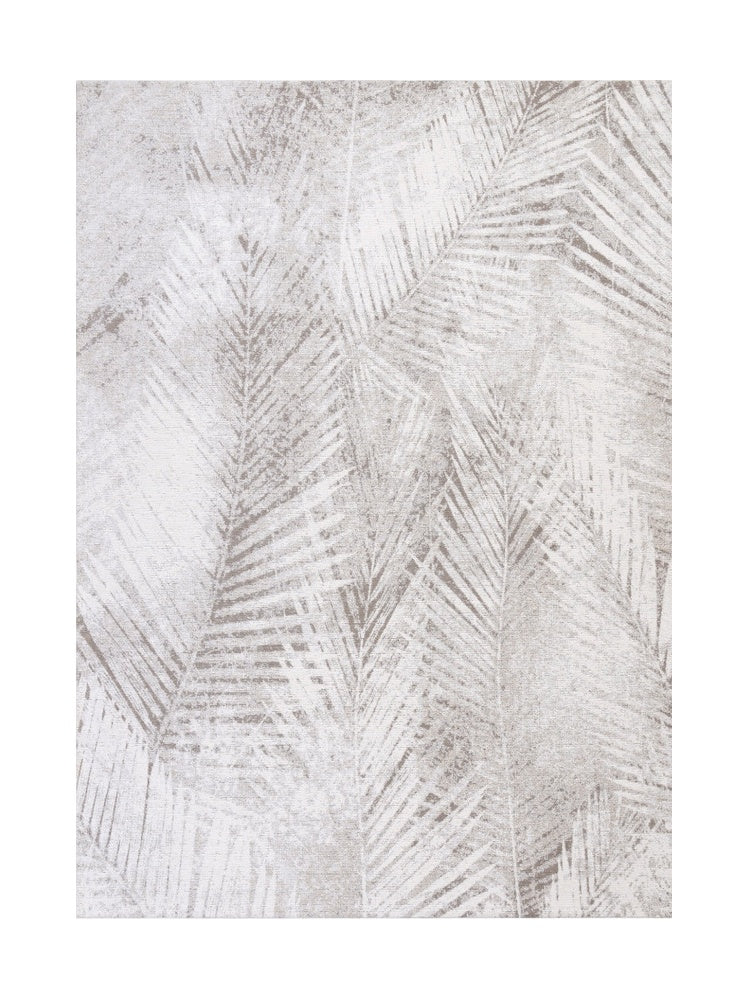 Tapis rectangulaire avec motif de feuilles de palmier en nuances d'ivoire et de gris, ambiance naturelle et apaisante