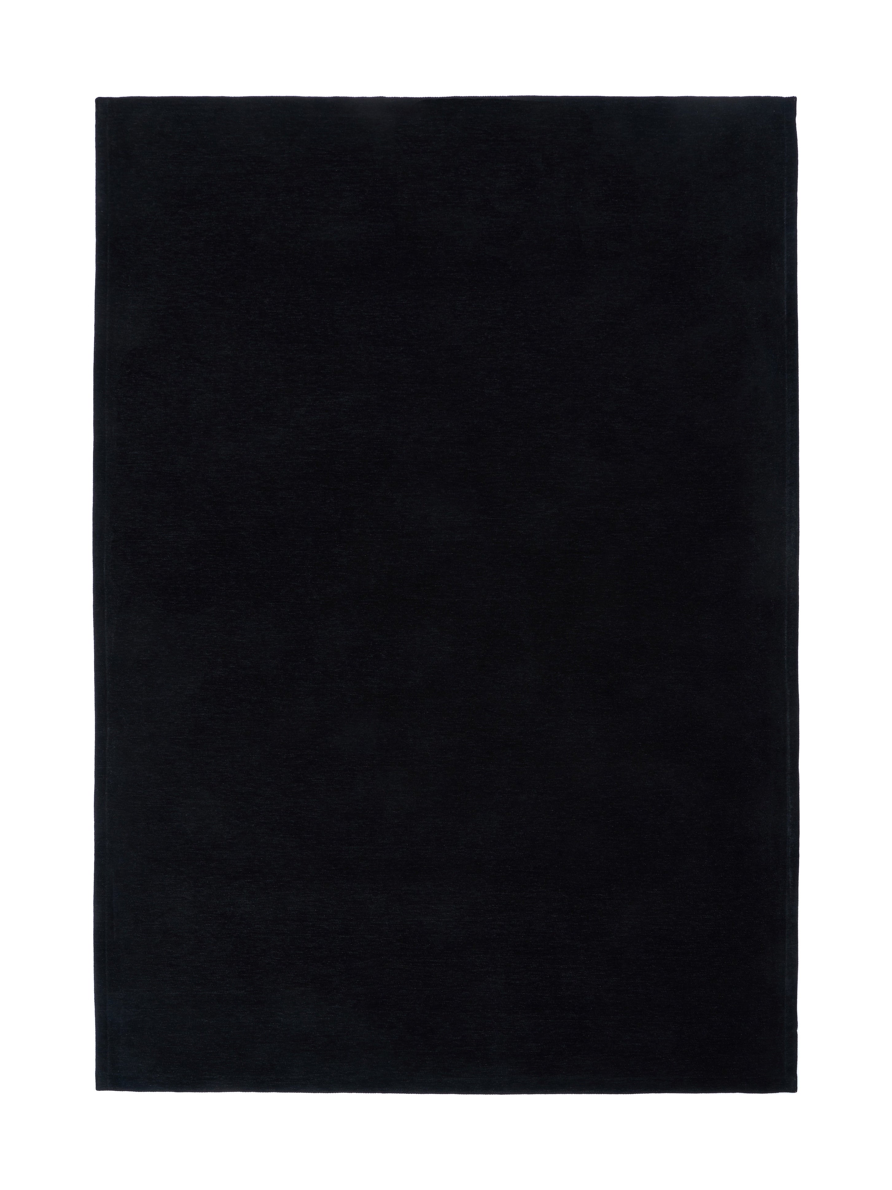 Tapis rectangulaire noir uni, style sobre, pour une ambiance moderne