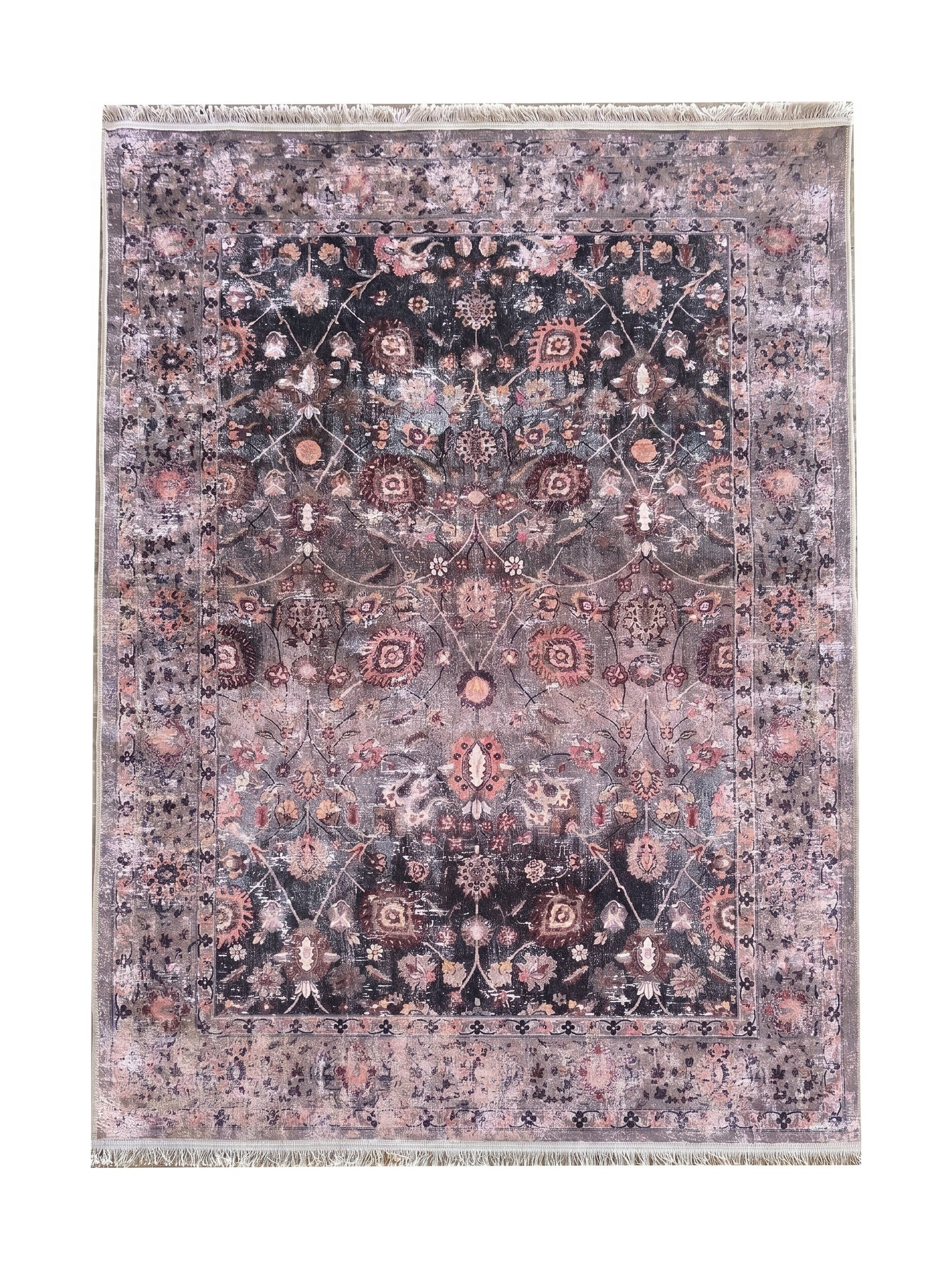Tapis rectangulaire aux motifs floraux et géométriques délavés dans des tons de gris, rose poudré et noir avec une bordure