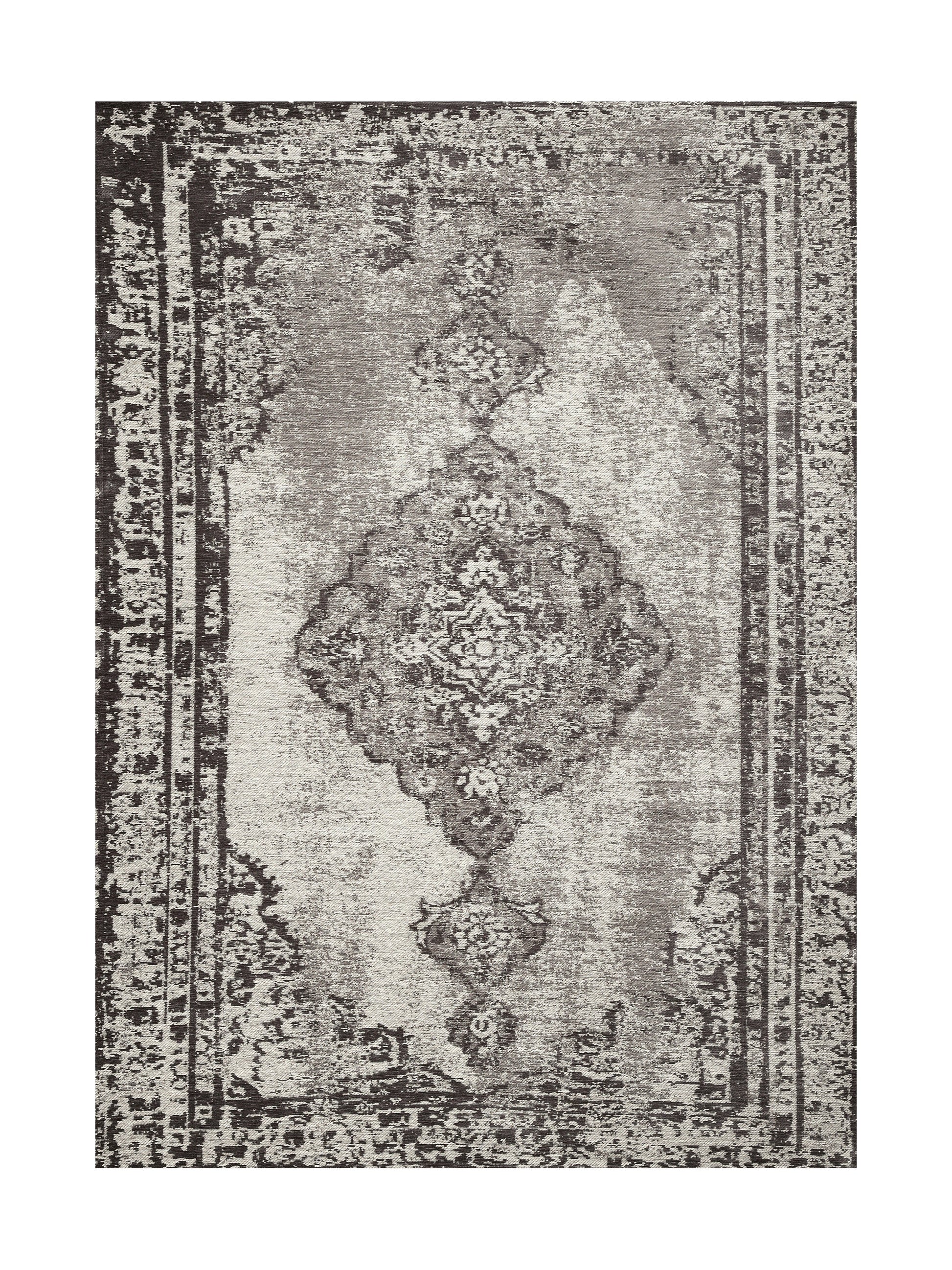 Tapis rectangulaire gris avec motif central élaboré et bordure sombre, ambiance feutrée