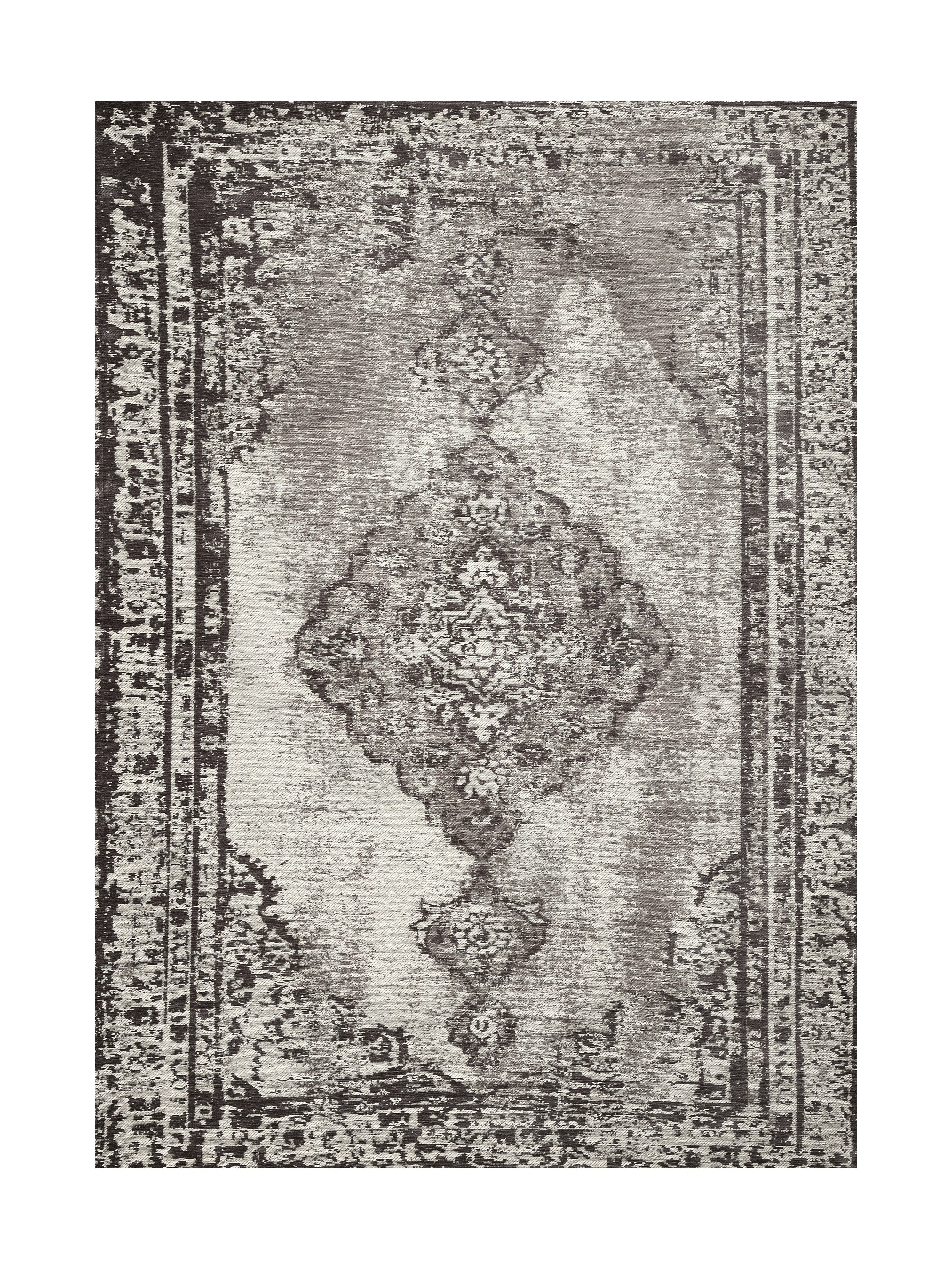 Tapis rectangulaire gris avec motif central élaboré et bordure sombre, ambiance feutrée