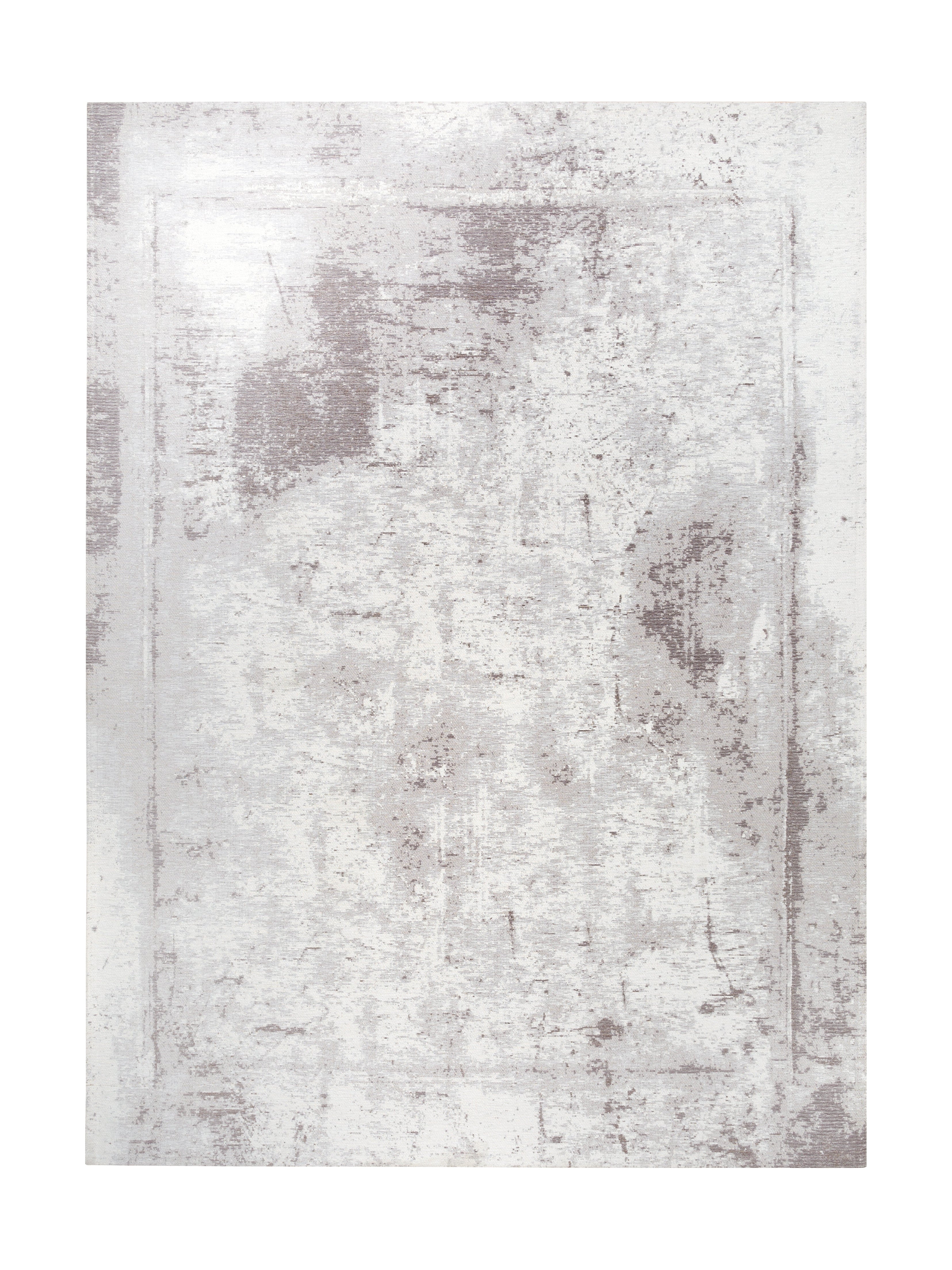 Tapis rectangulaire gris clair, style vieilli. Motifs irréguliers, ambiance sobre