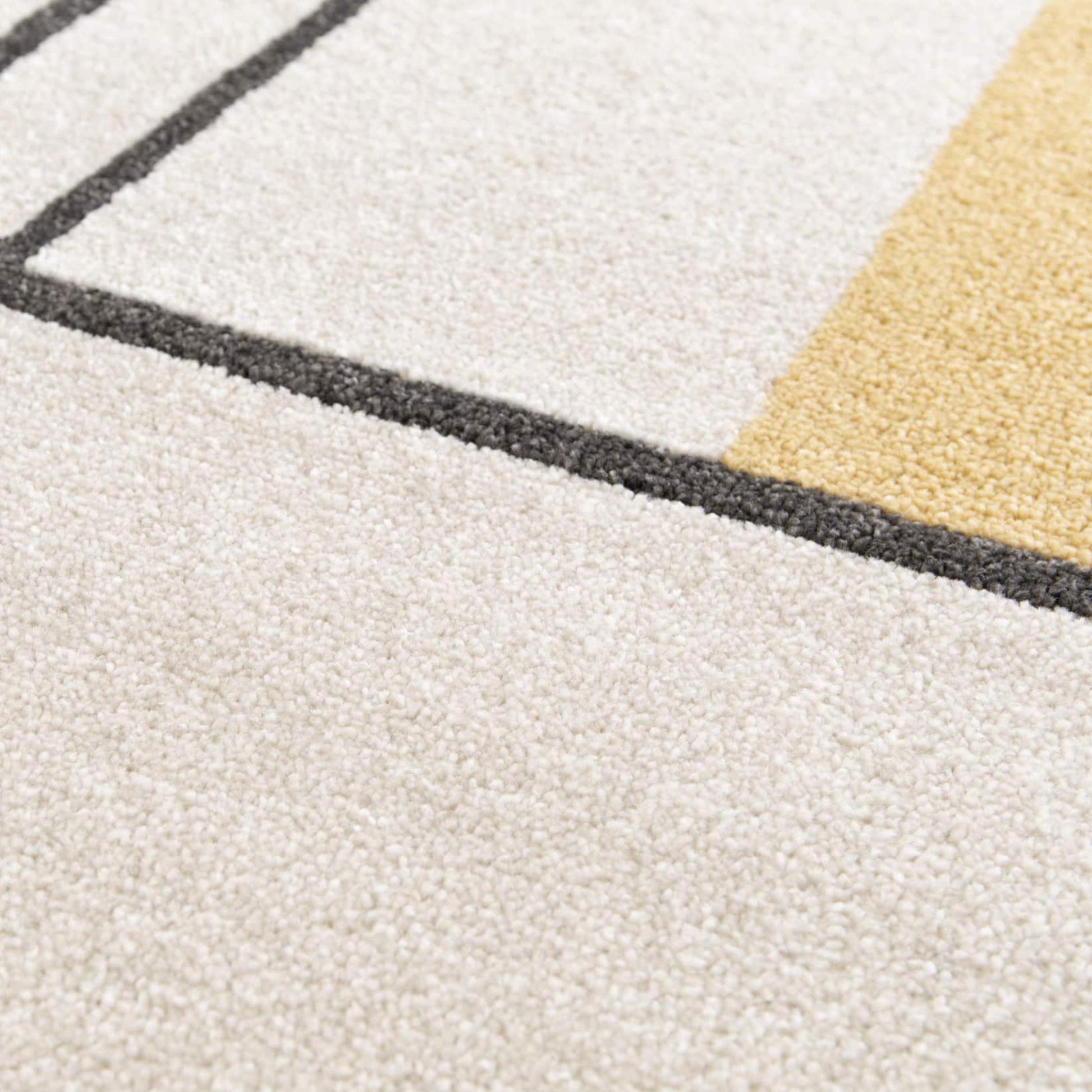 Tapis à poils doux et texturés, crème, avec des motifs géométriques gris foncé et jaune