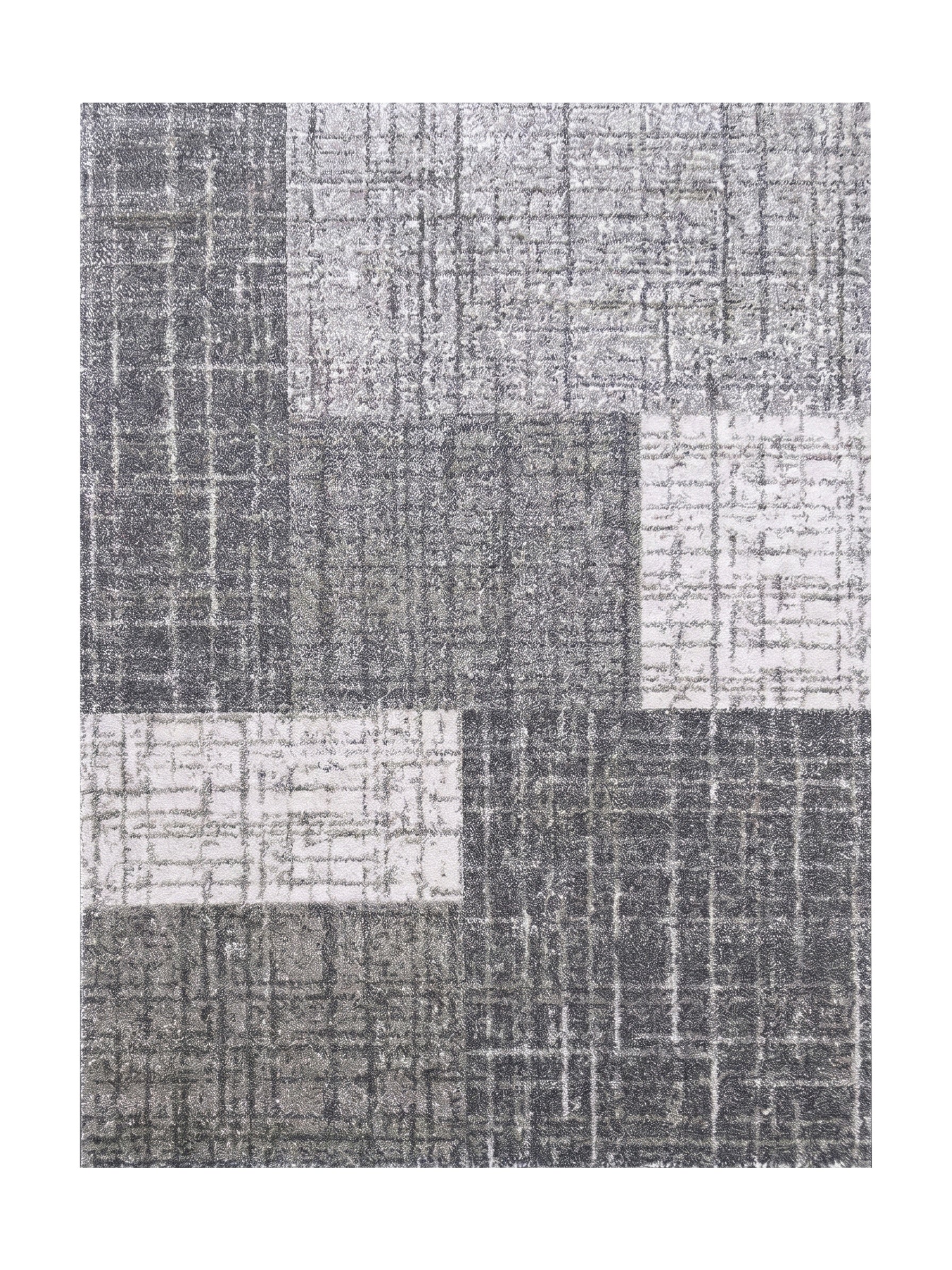 Tapis en poils ras gris et blanc, avec des motifs de blocs rectangulaires et un effet quadrillé