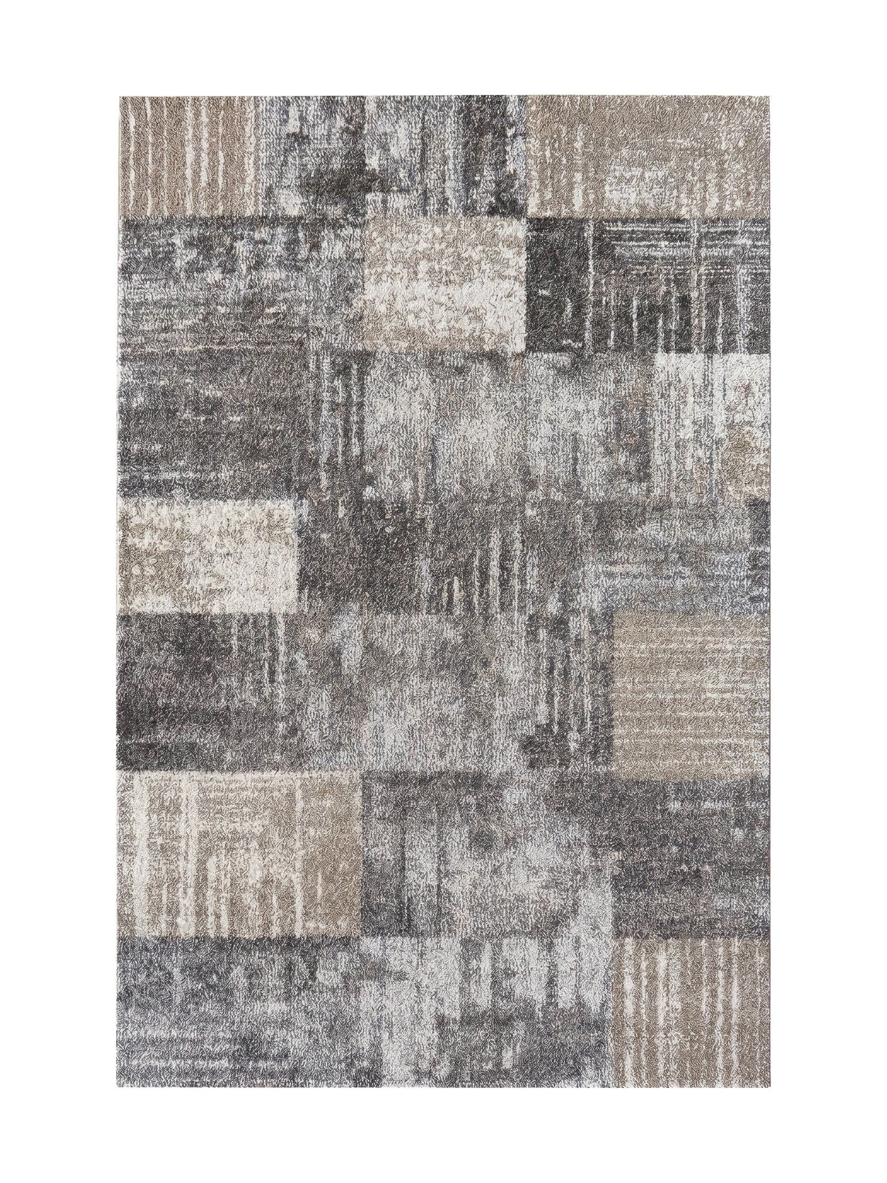Tapis rectangulaire en textile texturé, présentant un motif abstrait de blocs gris et beiges avec des nuances foncées et claires
