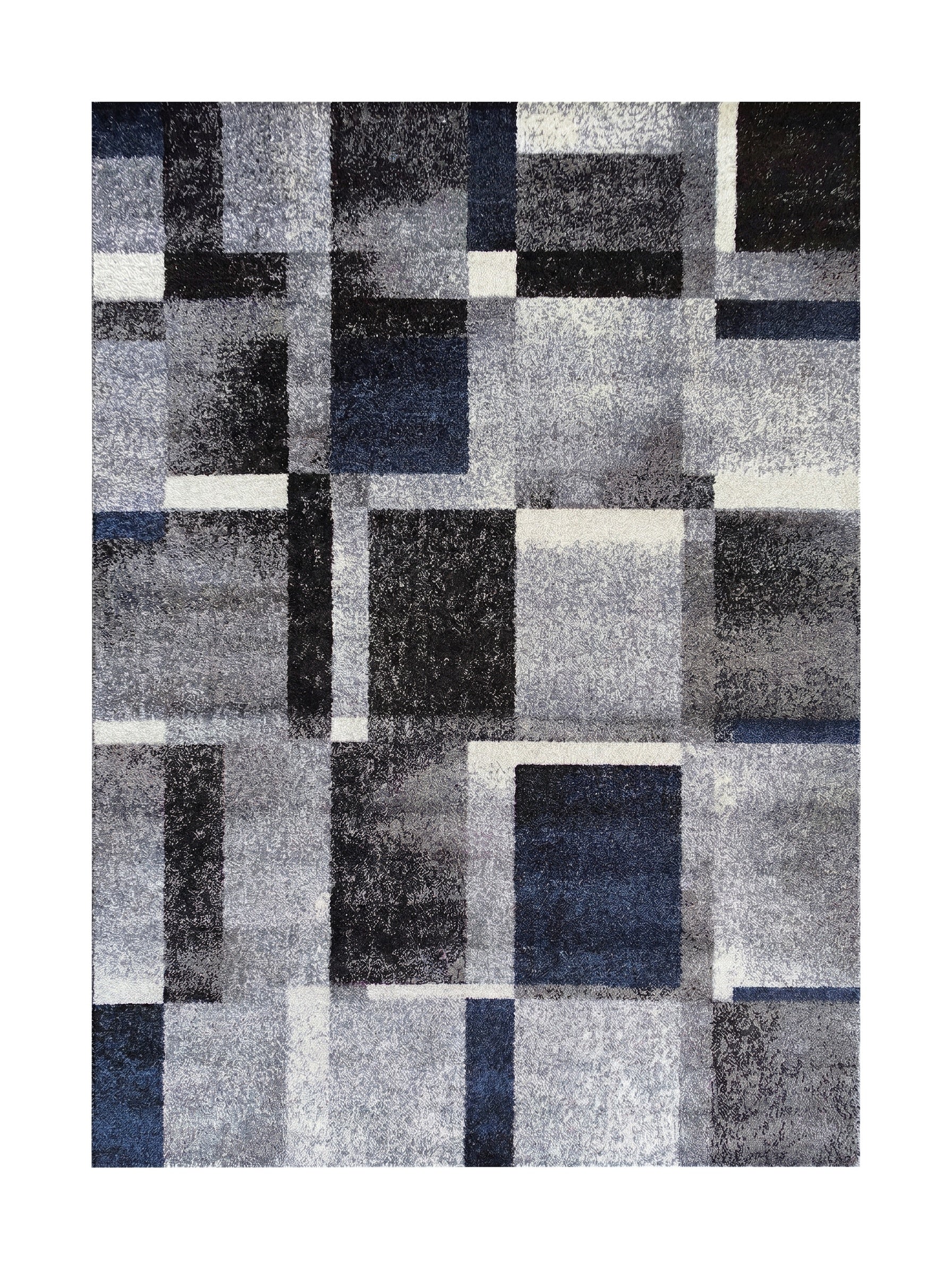 Tapis rectangulaire en textile à poils, avec un motif géométrique de blocs et bandes gris, noirs, blancs et bleu foncé
