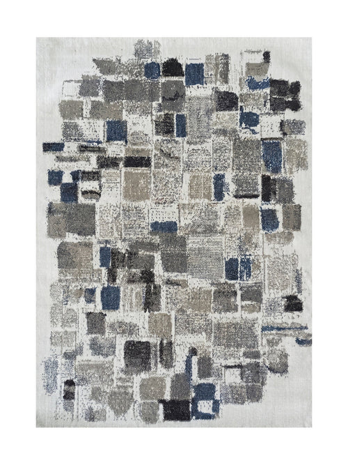 Tapis rectangulaire à motif abstrait de carreaux gris, bleus et noirs sur fond clair, avec une texture douce