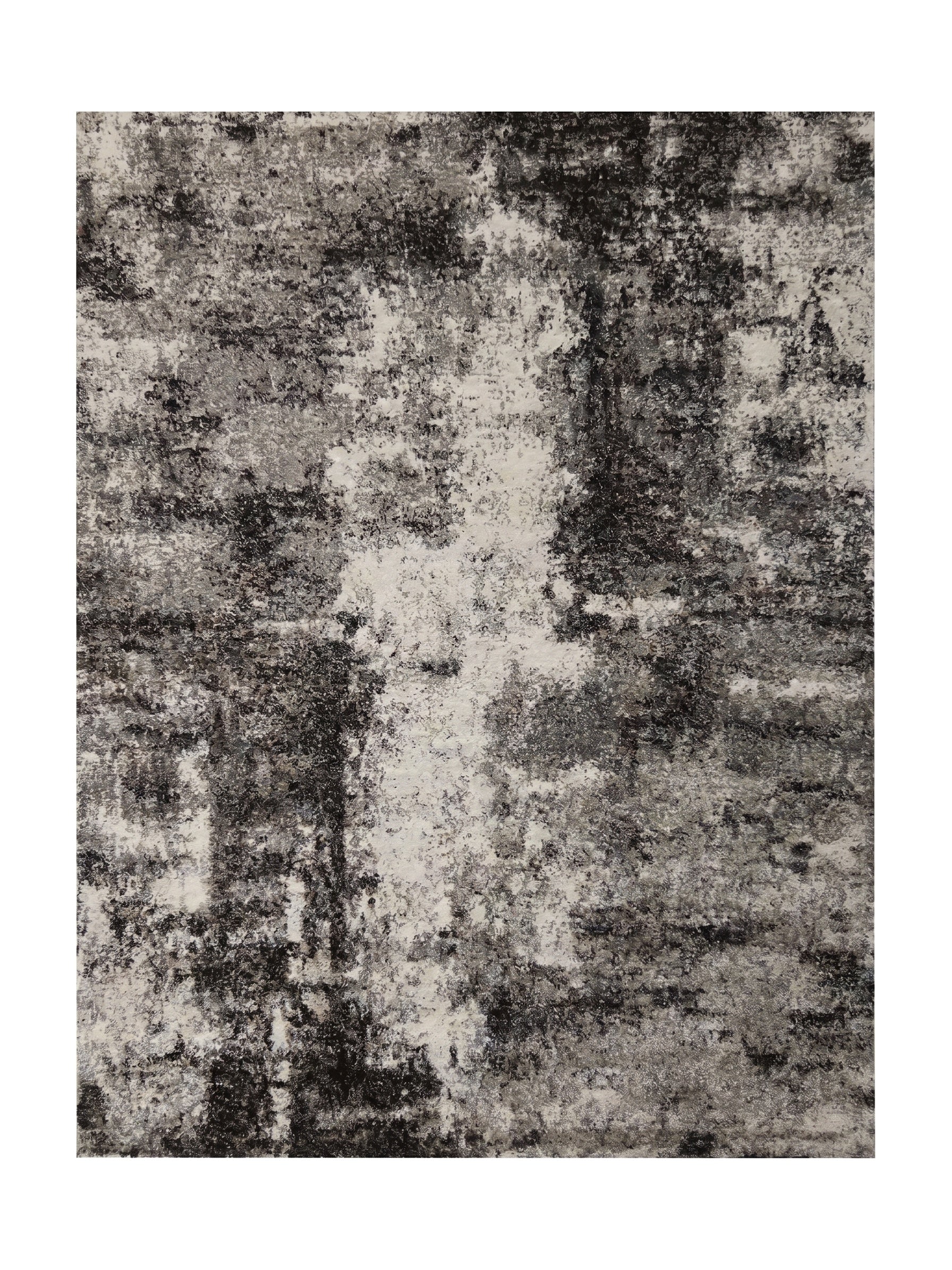 Tapis rectangulaire avec un motif abstrait moucheté en teintes de noir, gris anthracite et blanc clair