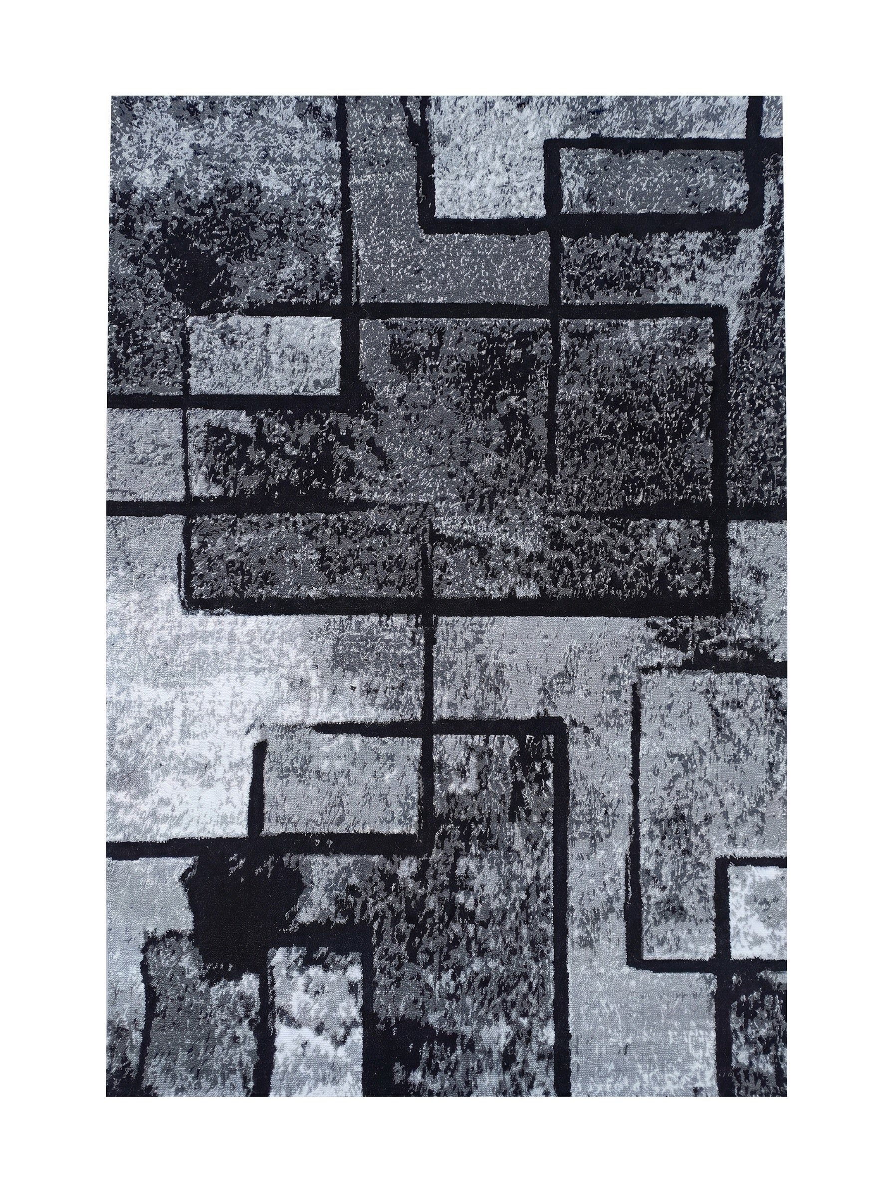 Tapis géométrique abstrait aux motifs de blocs et lignes entrelacés, dans des tons de gris, noir et blanc avec une texture mouchetée
