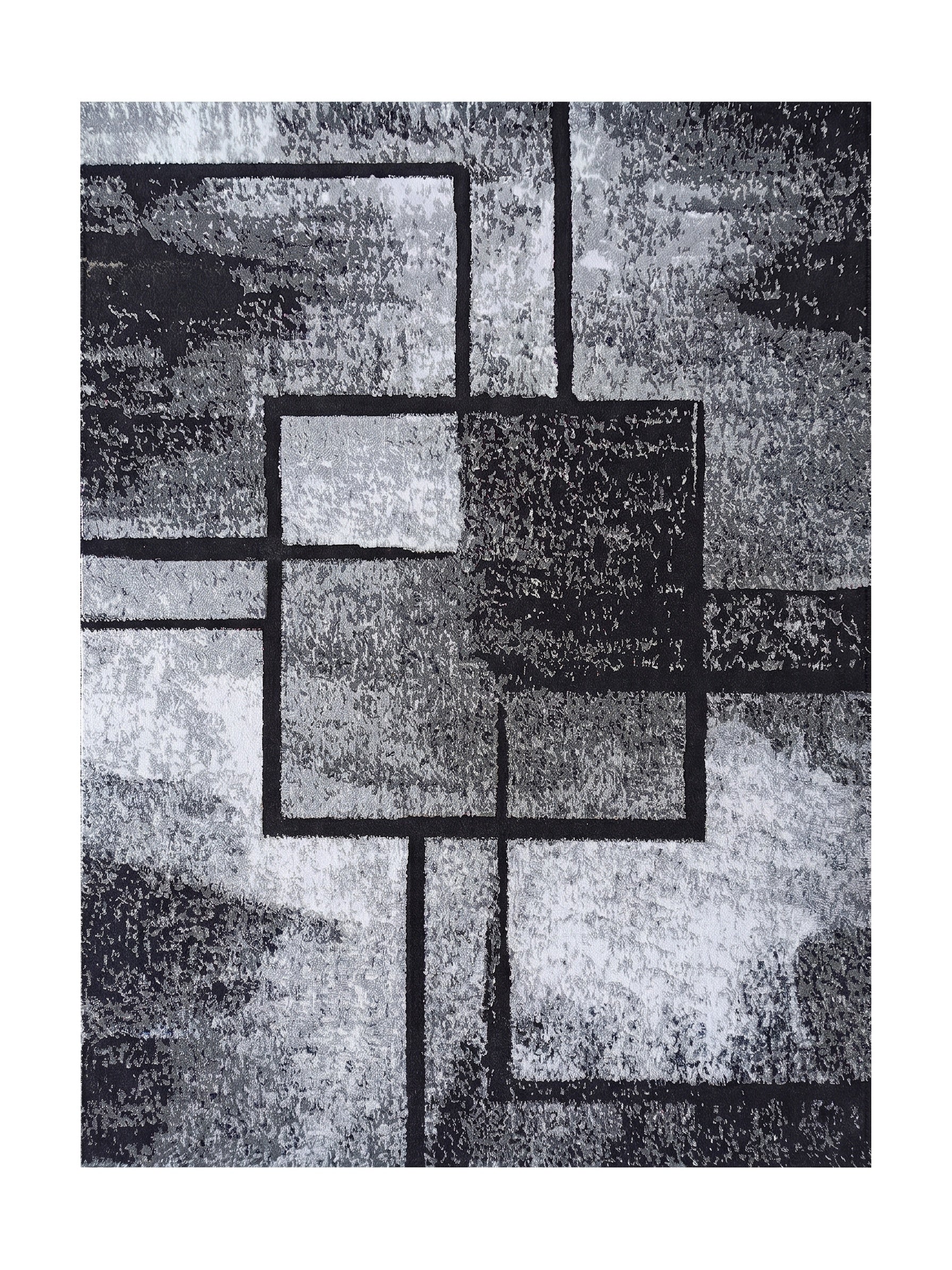Tapis moderne aux motifs géométriques abstraits en noir, gris et blanc, avec des lignes sombres formant des carrés et des rectangles sur une texture mouchetée