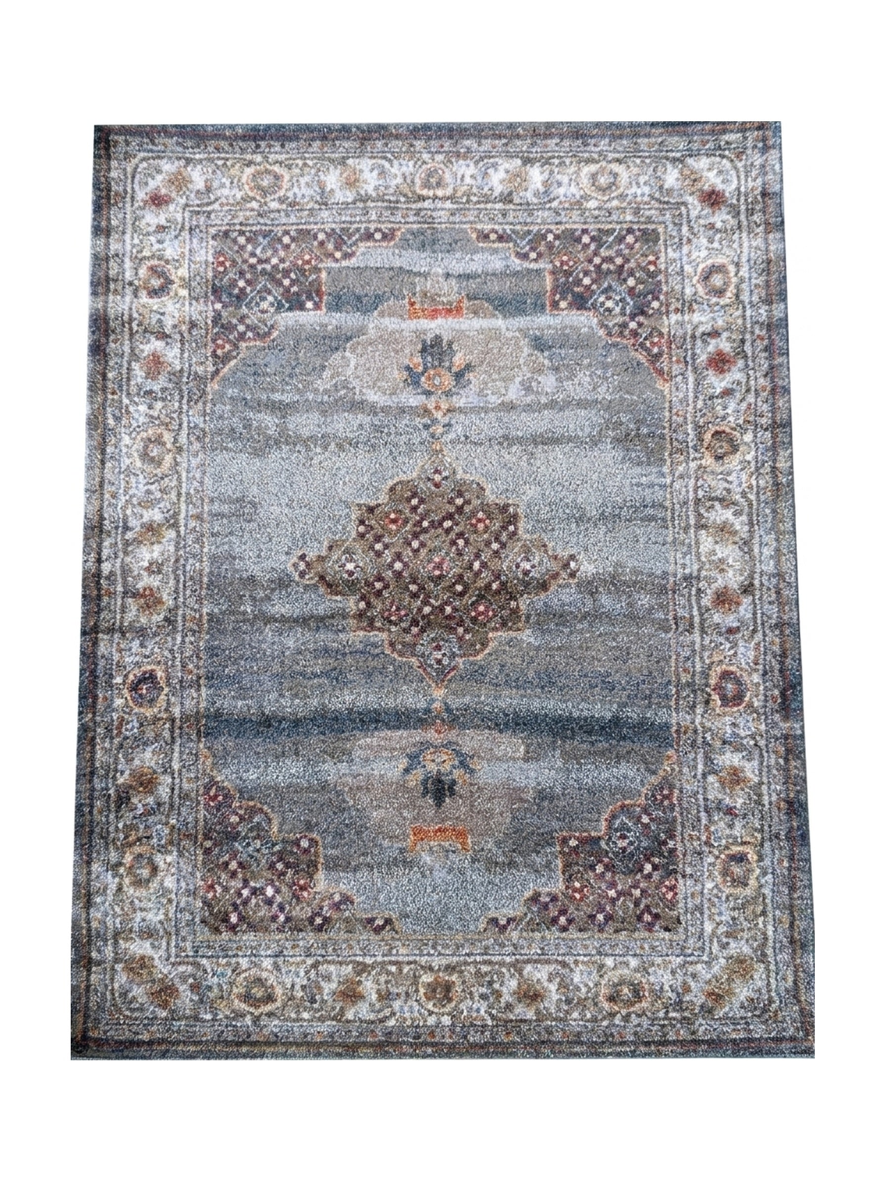 Tapis gris-bleu aux motifs orientaux délavés, médaillon central rouge-brun et bordure crème ornée