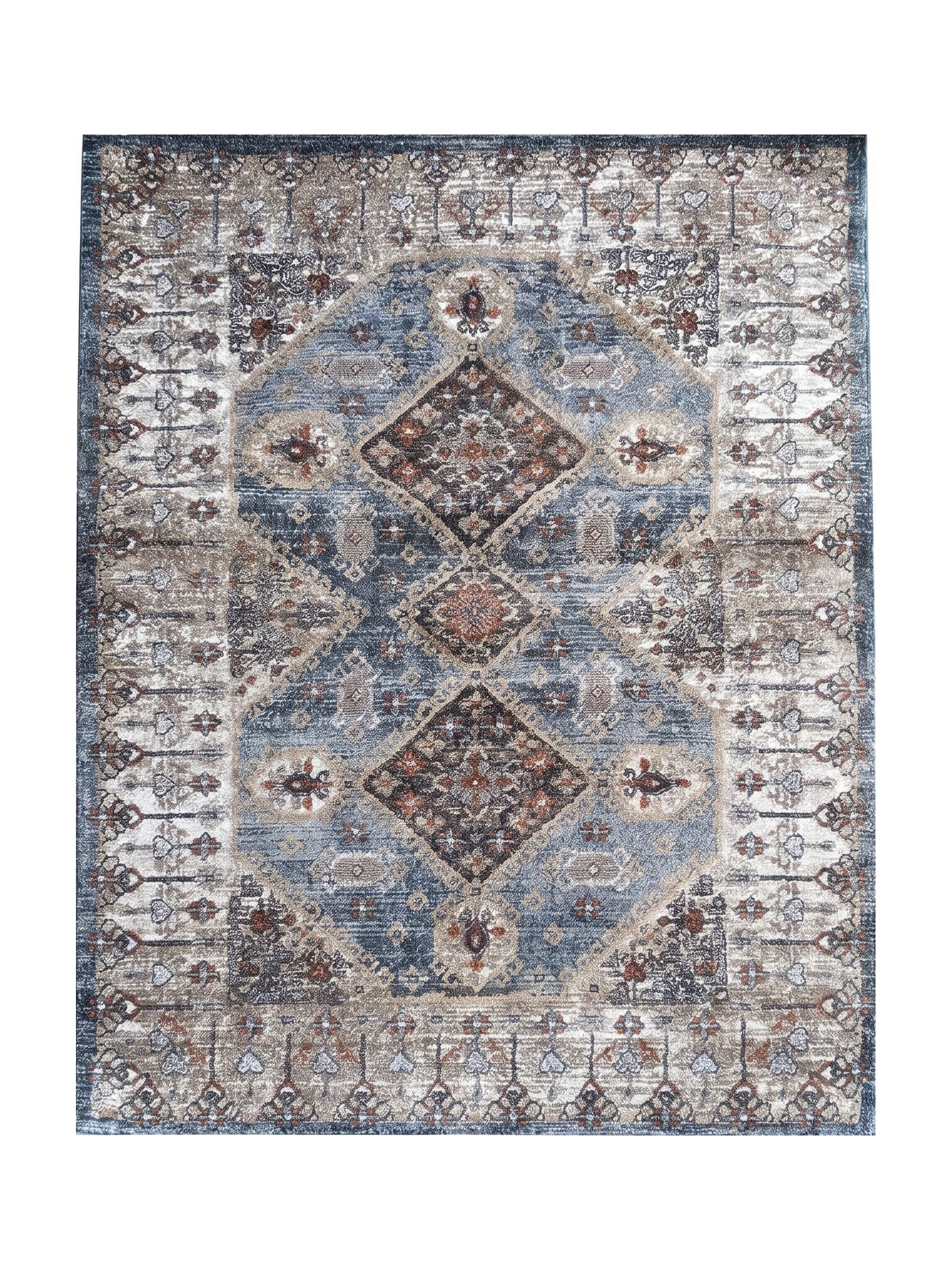 Tapis rectangulaire à motifs traditionnels bleu jean, beige et rouille, avec un médaillon central et une bordure bleue foncée
