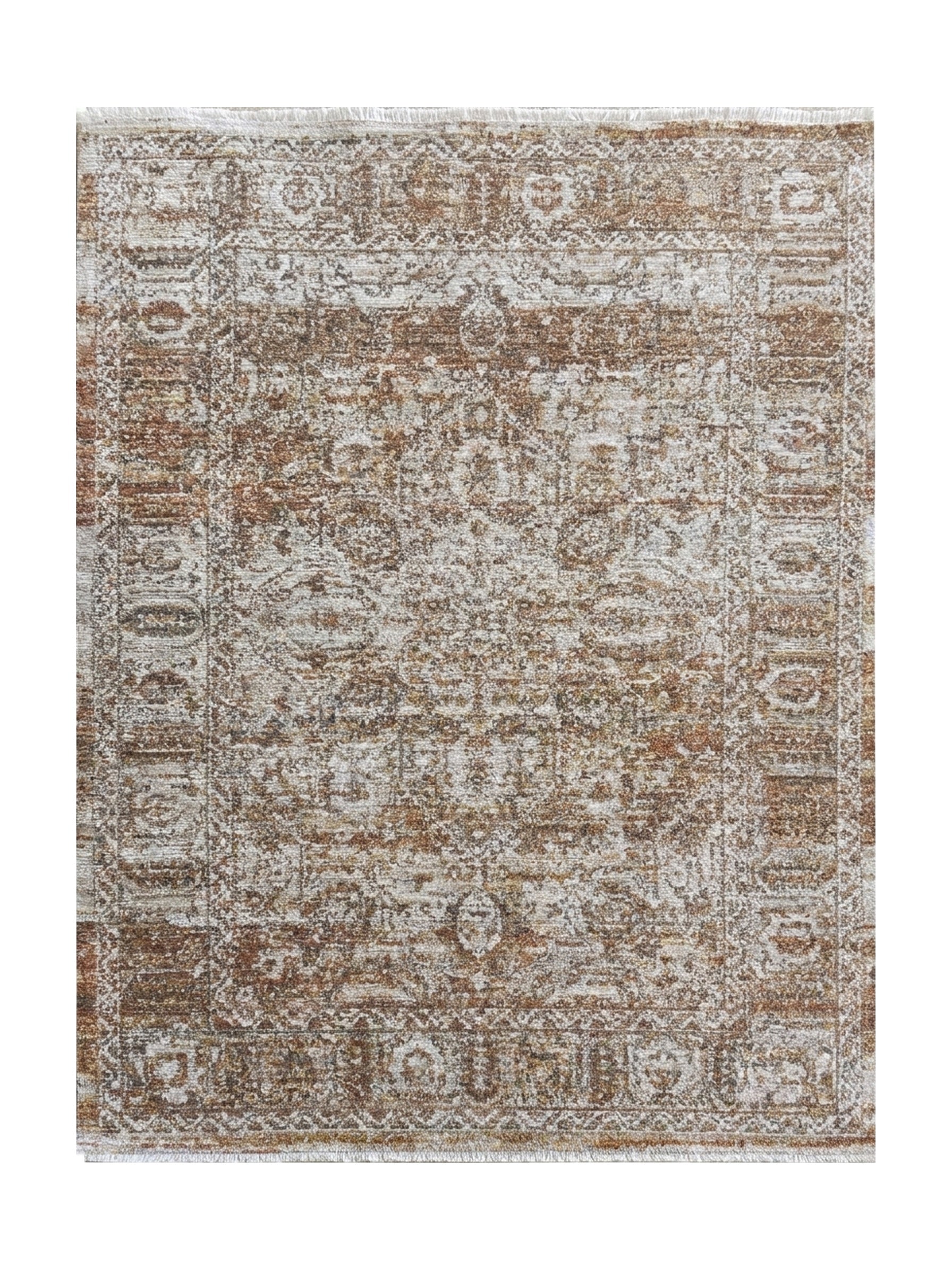 Tapis vieilli aux motifs orientaux complexes en tons marron rouille, beige et blanc cassé, frangé