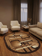 Tapis ovale marron et beige avec motifs géométriques abstraits et bords foncés, posé sur un parquet clair dans un salon