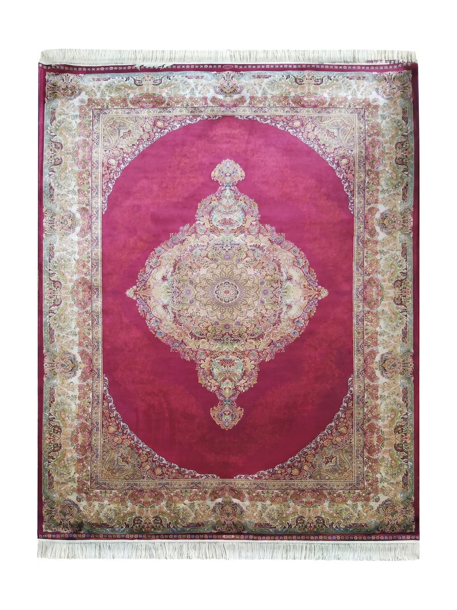 Tapis rouge à motifs floraux complexes et médaillon central orné de couleurs variées, avec des franges blanches