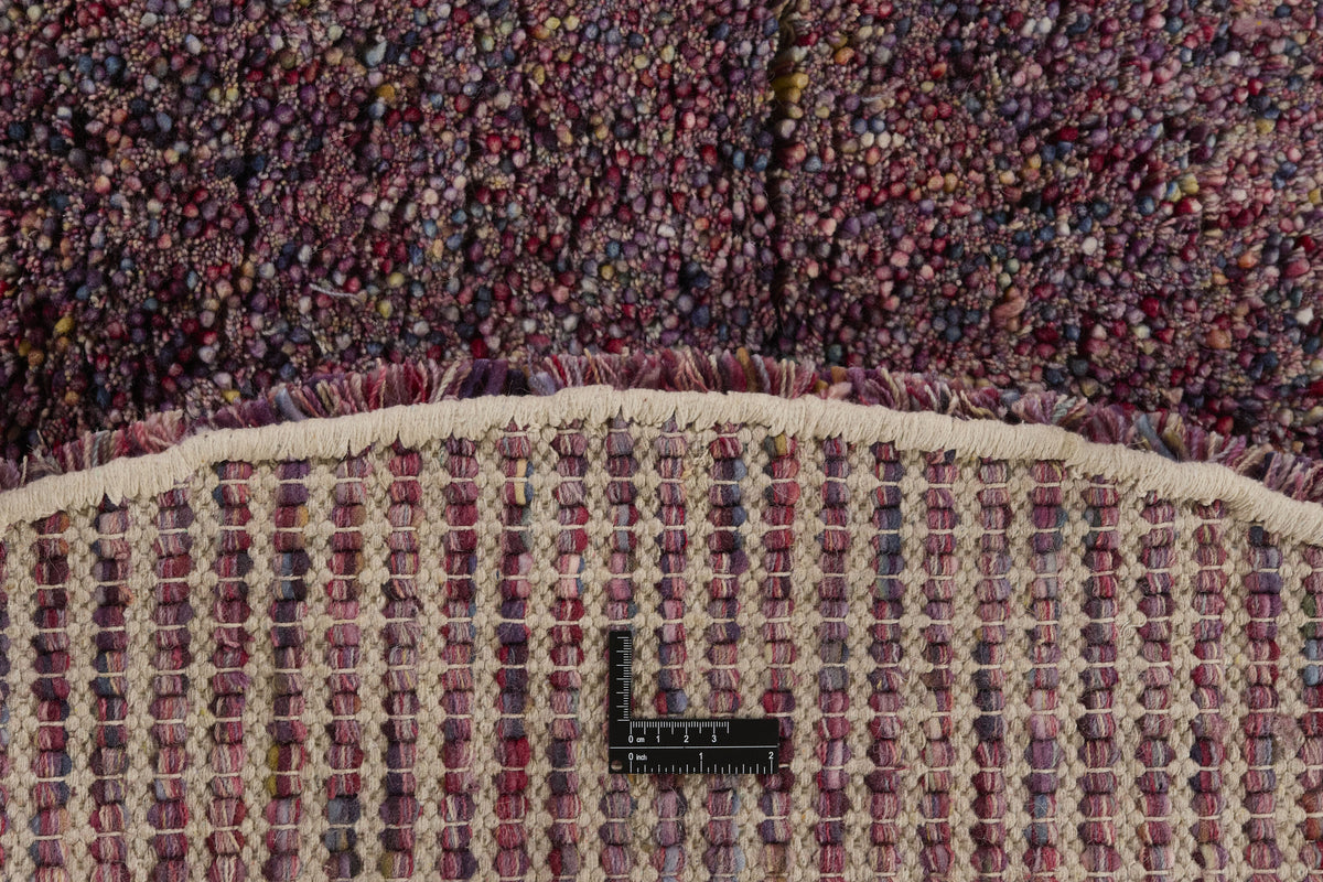 Raspberry Plum Round 100% Wool Rug - Folto, close-up of the texture