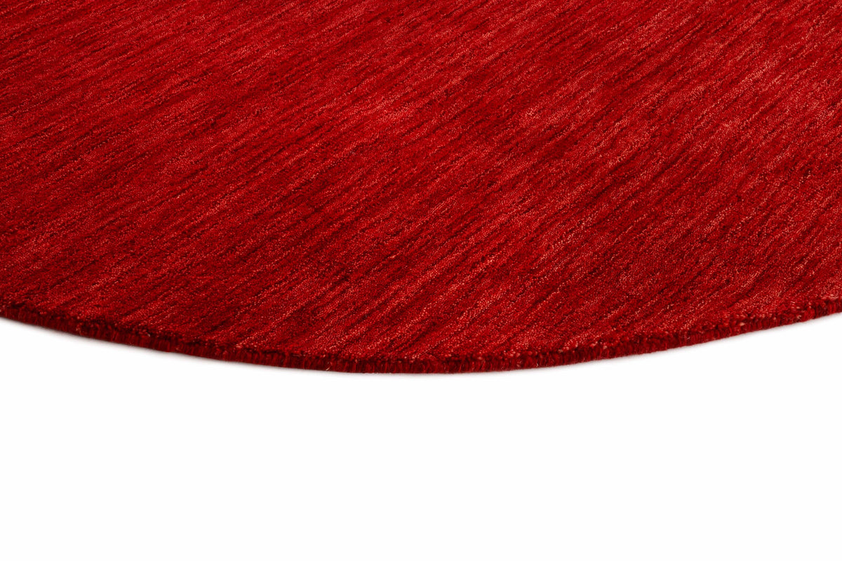Wollteppich rund Karminrot - Filato, Detail des Materials