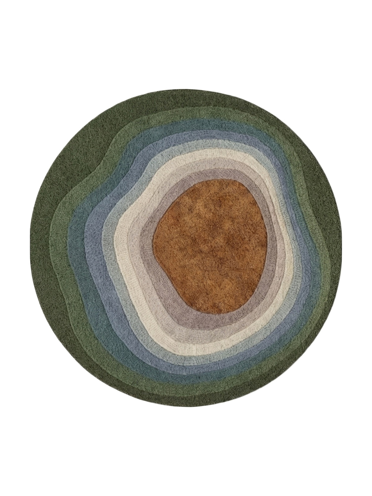 Un tapis en laine tuftée, rond et moelleux, dévoile des bandes organiques vert, bleu-gris et caramel
