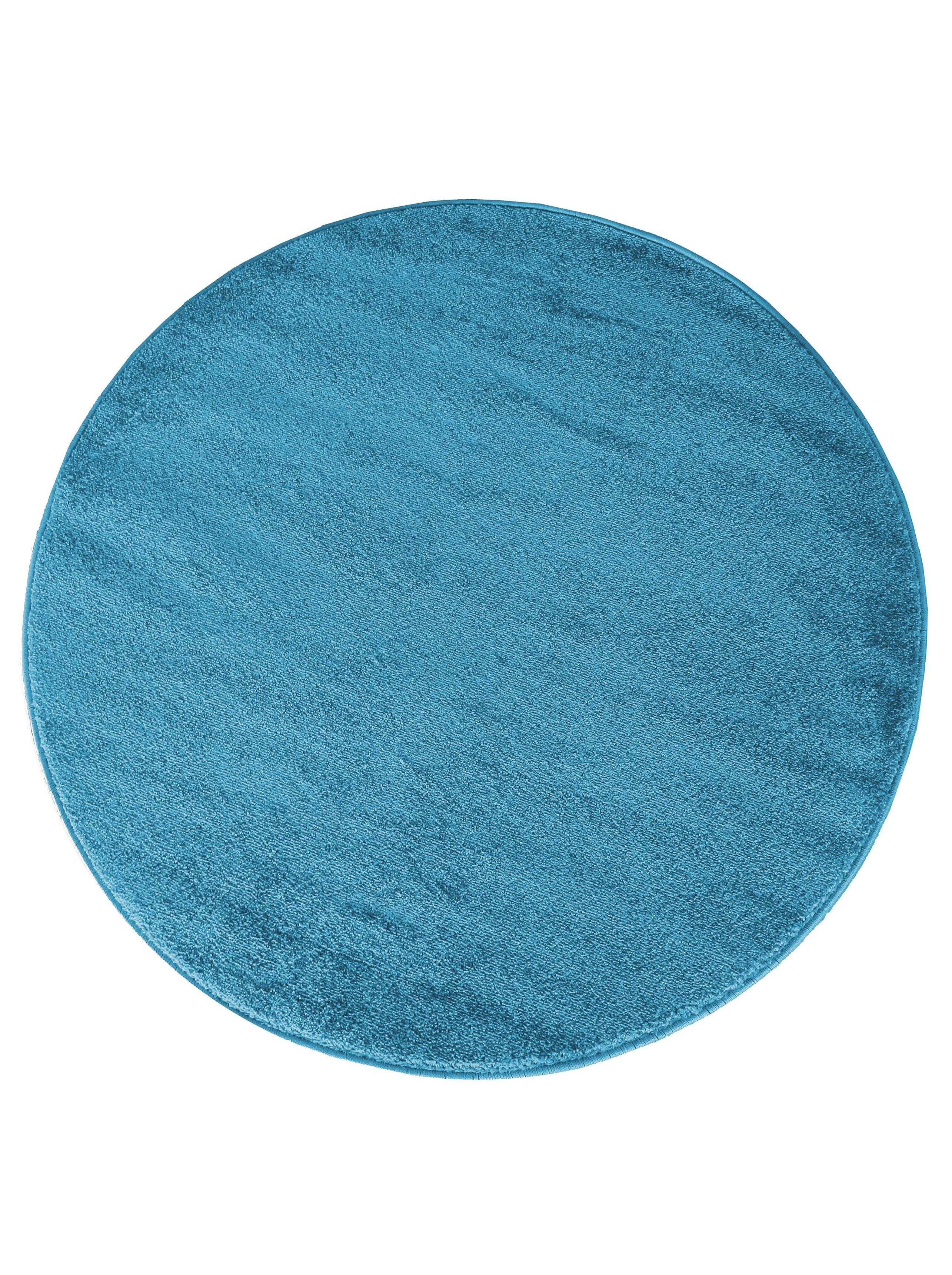 Tapis circulaire bleu canard uni, présentant une texture douce et une surface veloutée aux reflets moirés