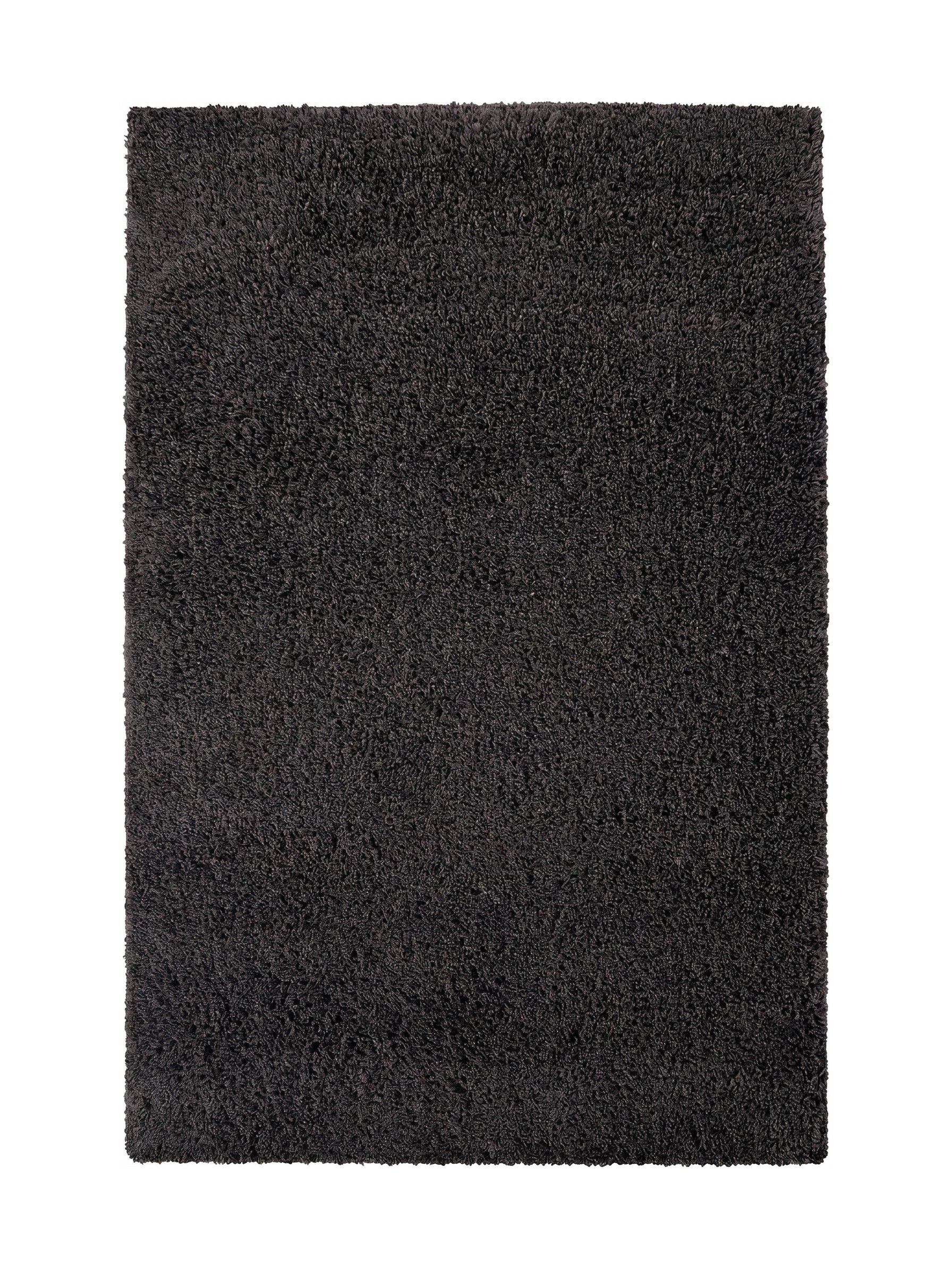 Tapis rectangulaire gris anthracite à poils longs et texture moelleuse, posé sur un fond blanc pur